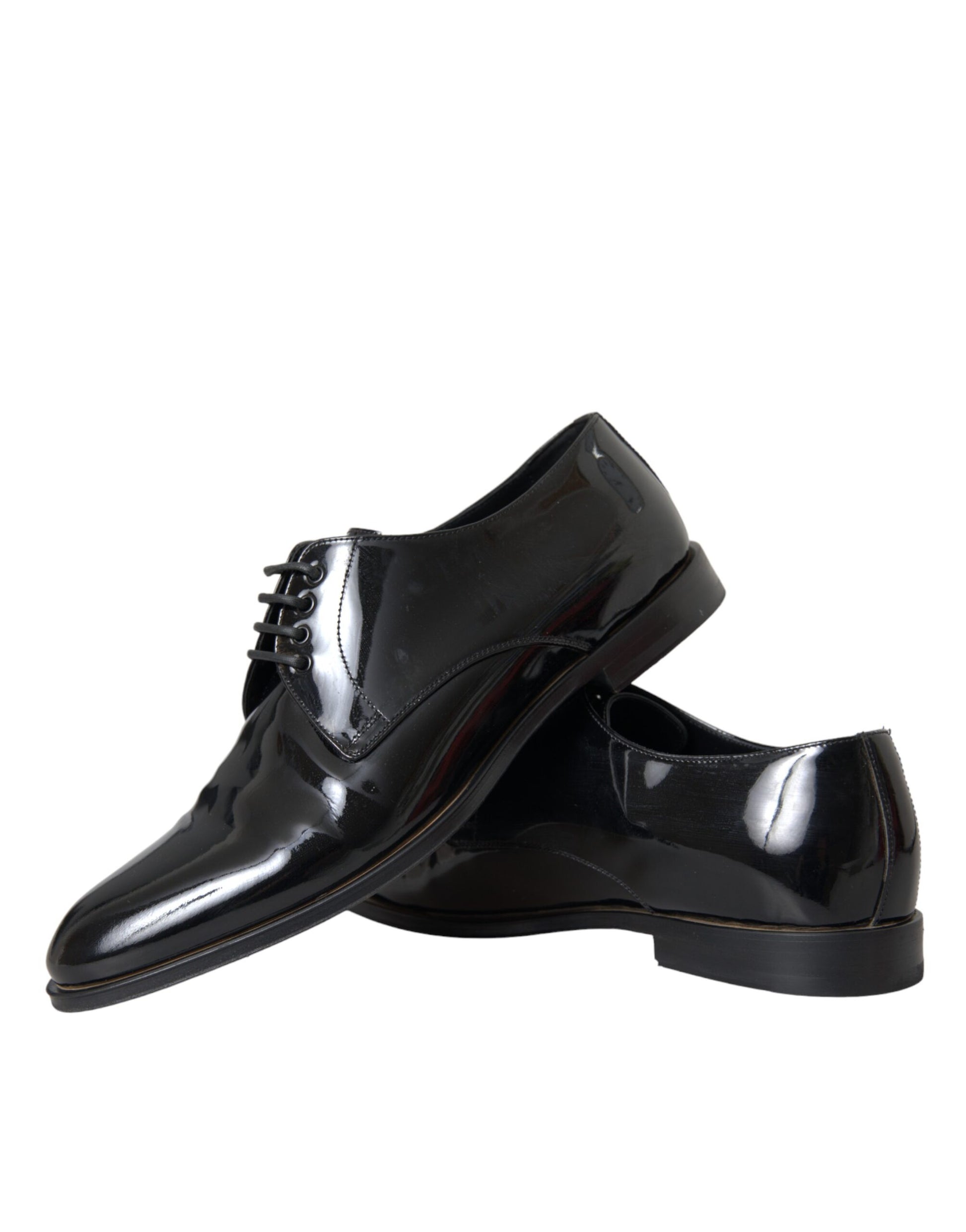 Pair of black patent leather dress shoes with laces and a shiny finish