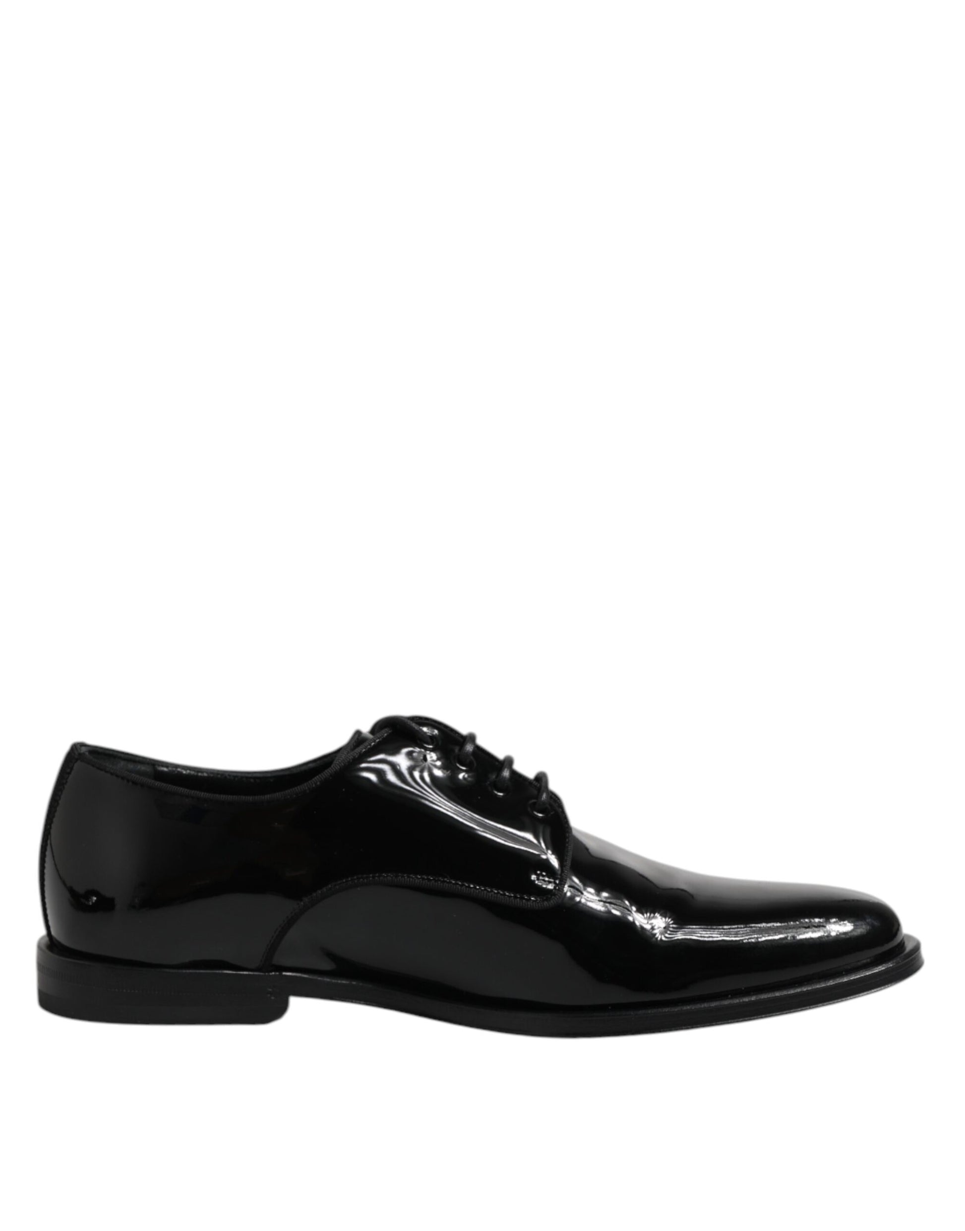 A pair of black patent leather dress shoes with a shiny finish, featuring a lace-up design and a low heel