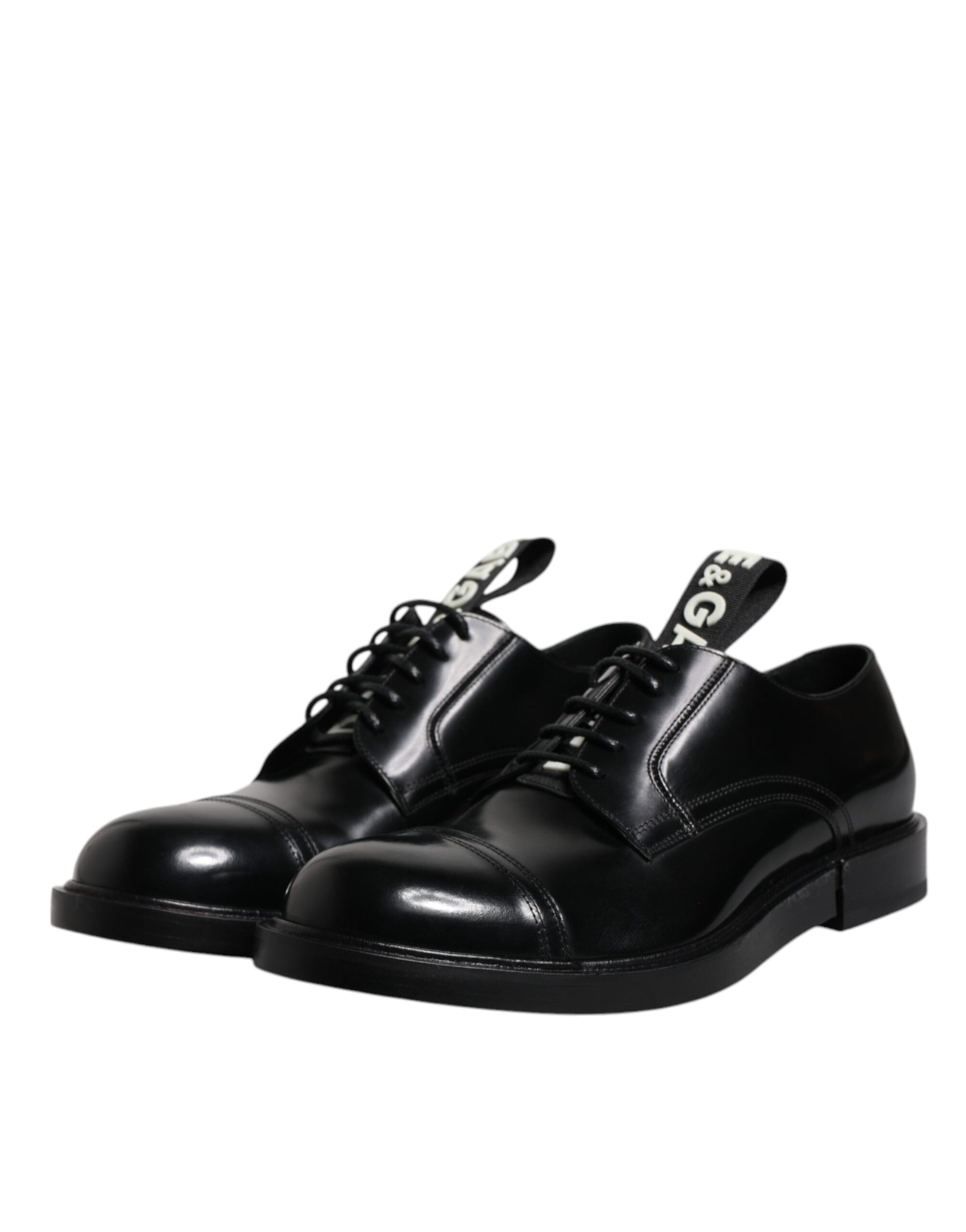 Pair of black patent leather dress shoes with laces, featuring a derby style and a shiny finish
