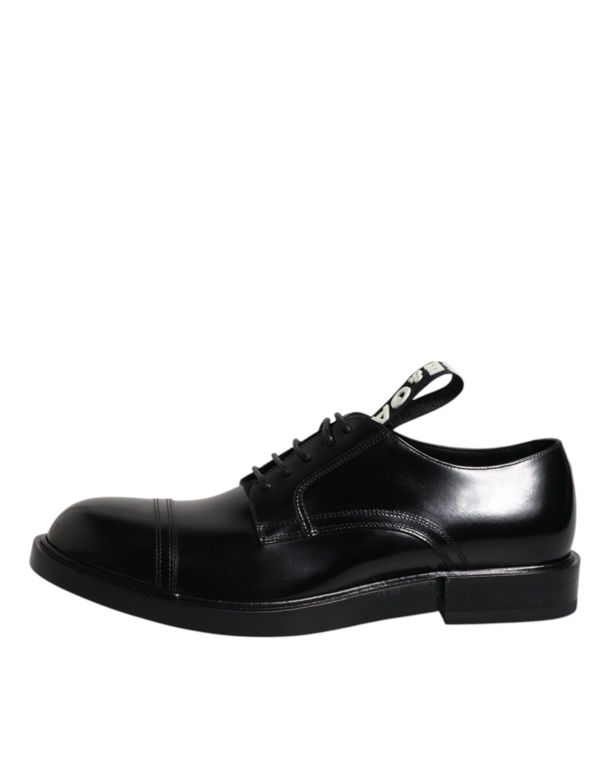 A pair of black patent leather dress shoes with laces, featuring a derby style and a polished finish