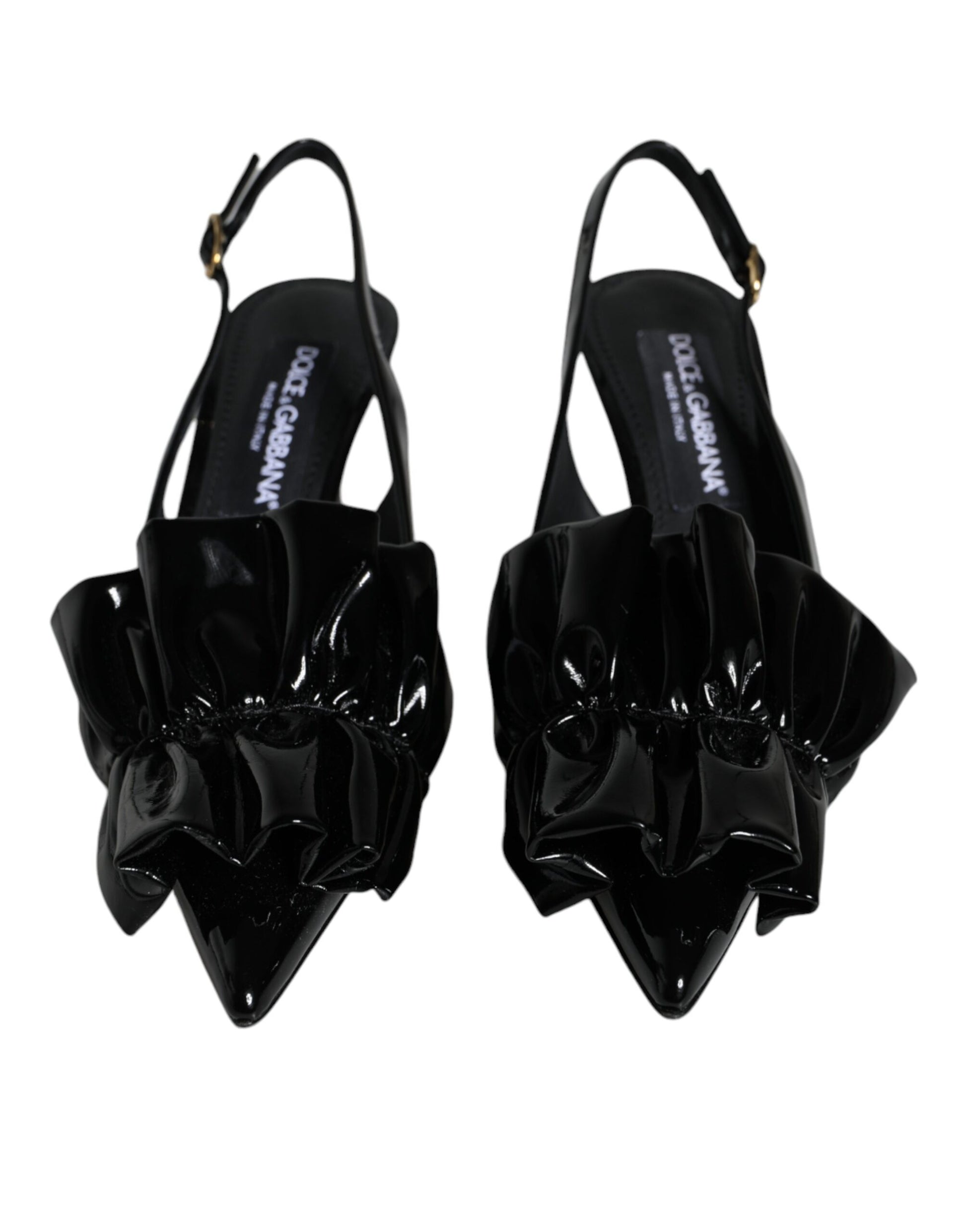 Pair of black high heel shoes with ruffled detailing