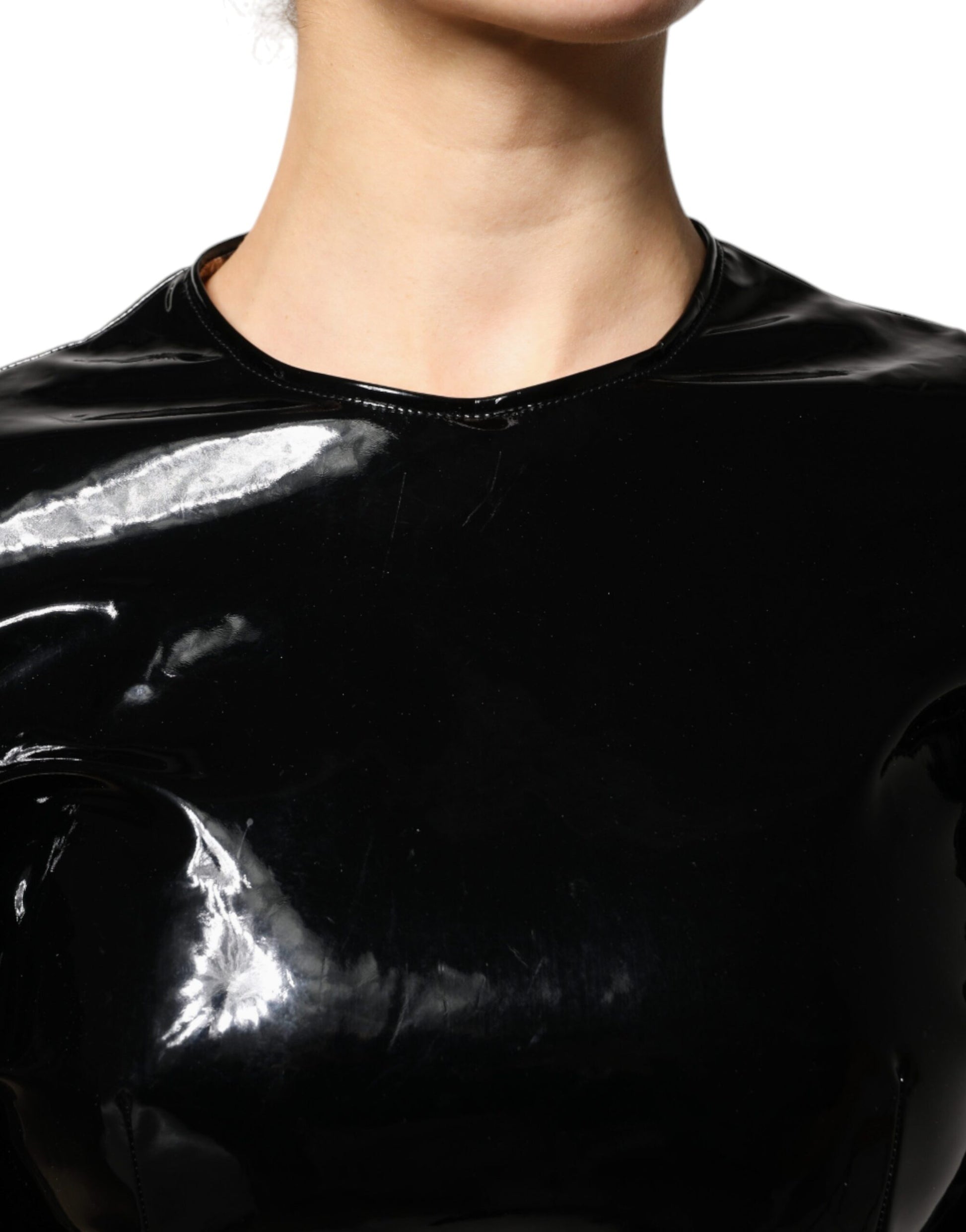 A black patent leather dress with puff sleeves