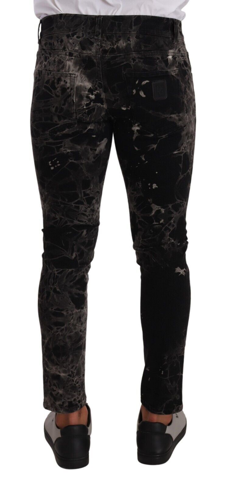 Pair of black pants with a marbled pattern