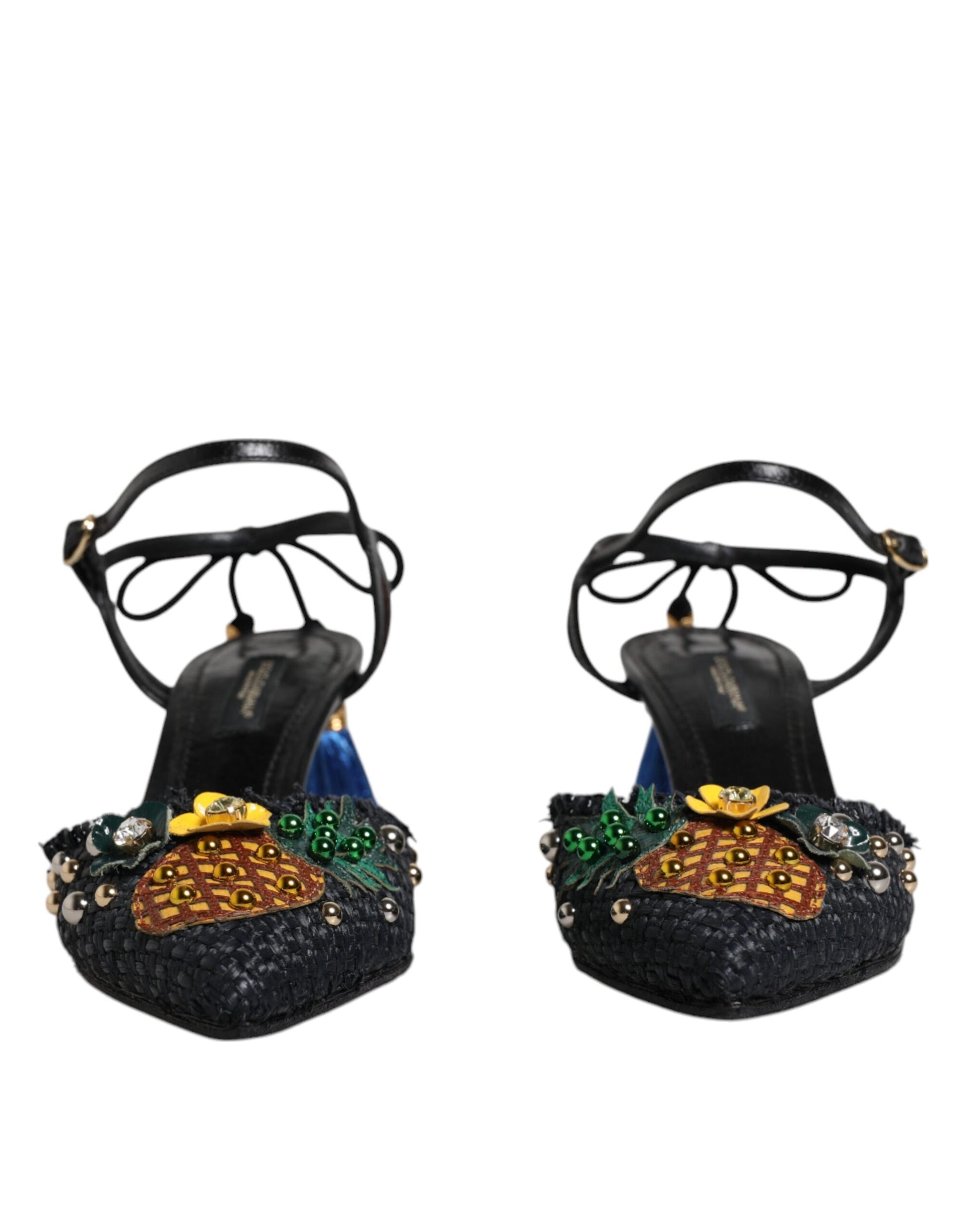 Pair of black high heel shoes with embellishments