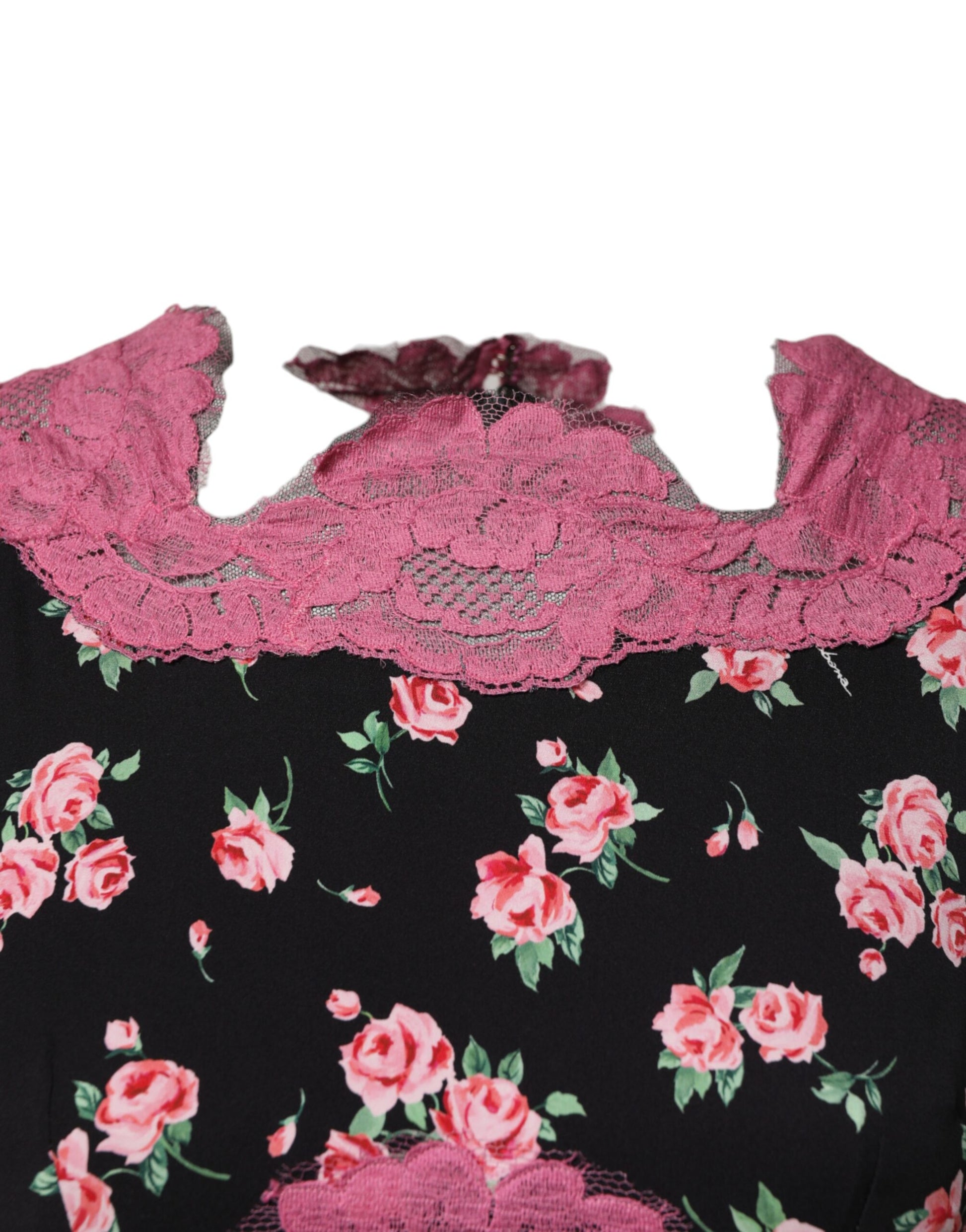 A black dress with pink floral lace and silk sheath details
