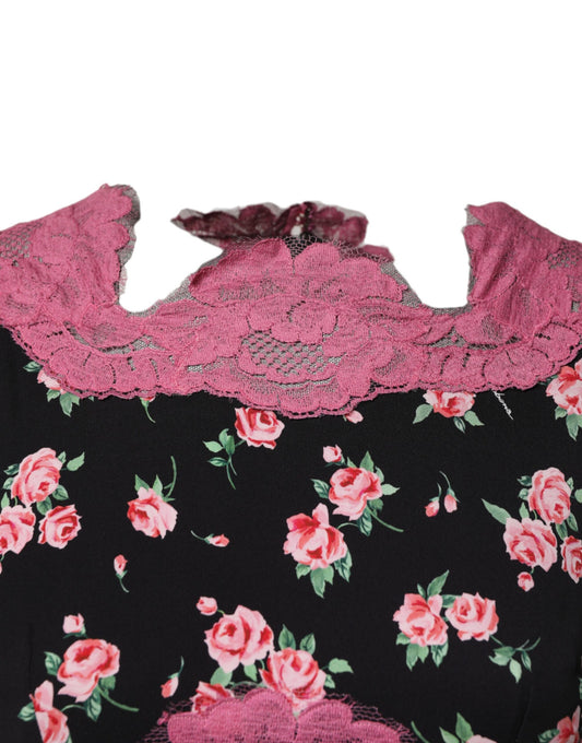 A black dress with pink floral lace and silk sheath details