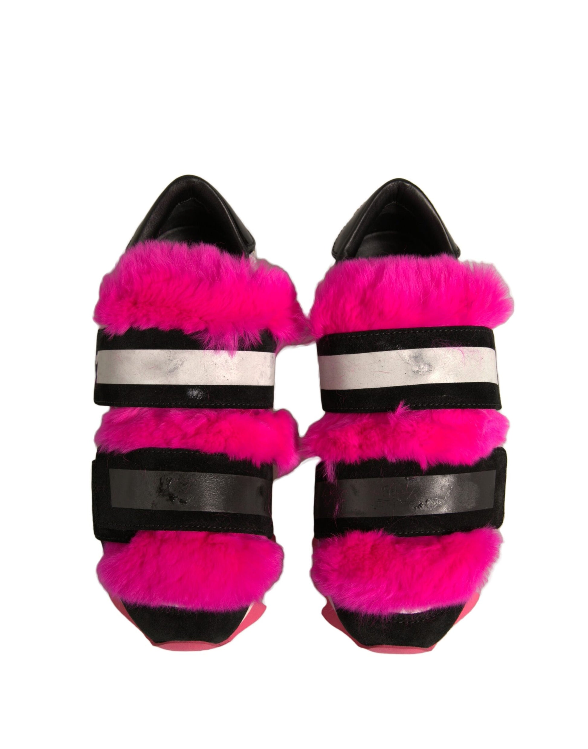 Pair of pink and black furry shoes
