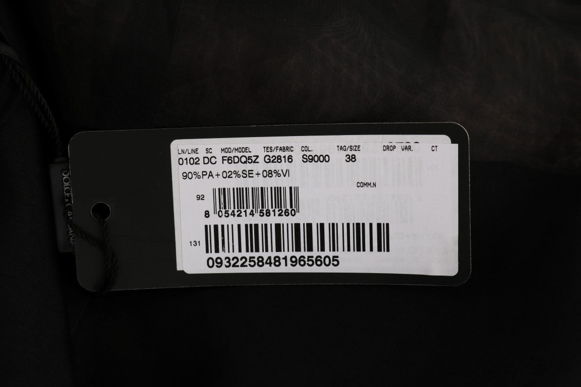 Black tag on clothing with white barcode and serial number