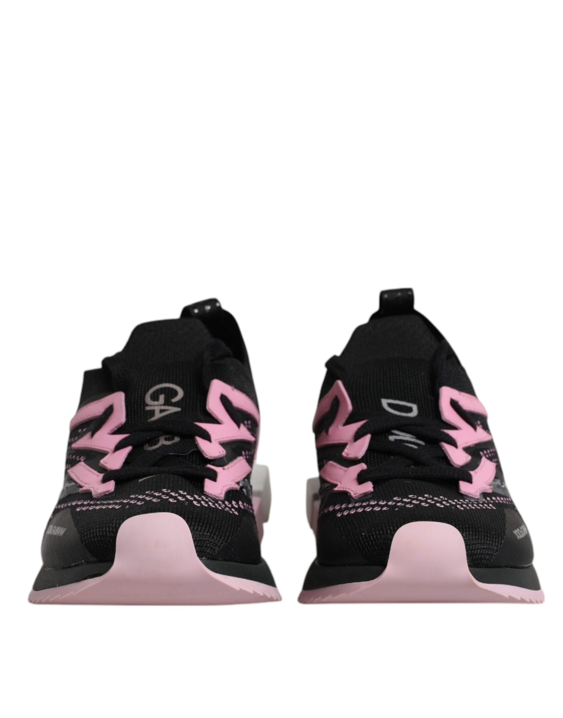Pair of black and pink sneakers with white laces, branded logo on side