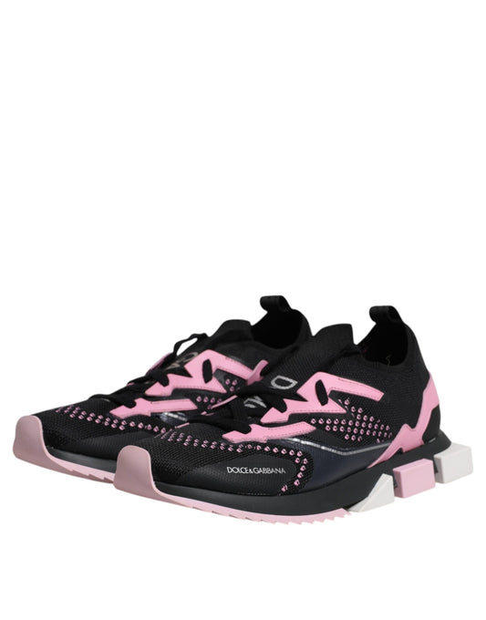 A pair of black and pink sneakers with a stretchy design, featuring the Dolce & Gabbana logo