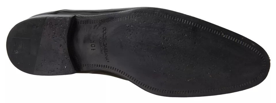 A pair of black polished leather formal dress shoes by Dolce & Gabbana