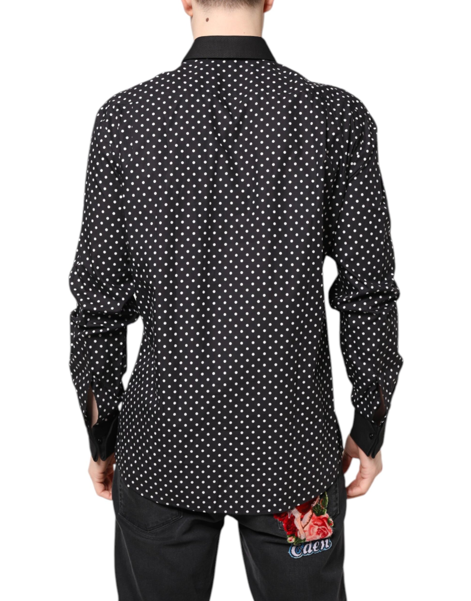 A black polka dot dress shirt with a floral print on the back