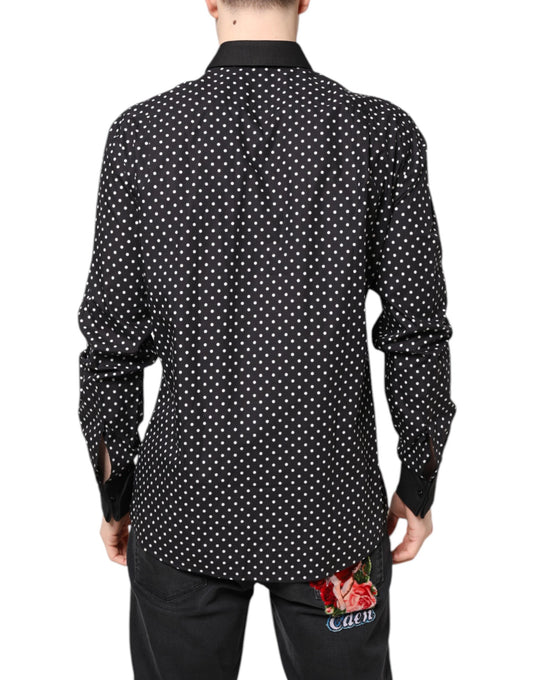 A black polka dot dress shirt with a floral print on the back