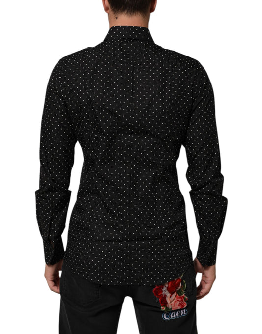 A black polka dot dress shirt with a gold collar and cuffs