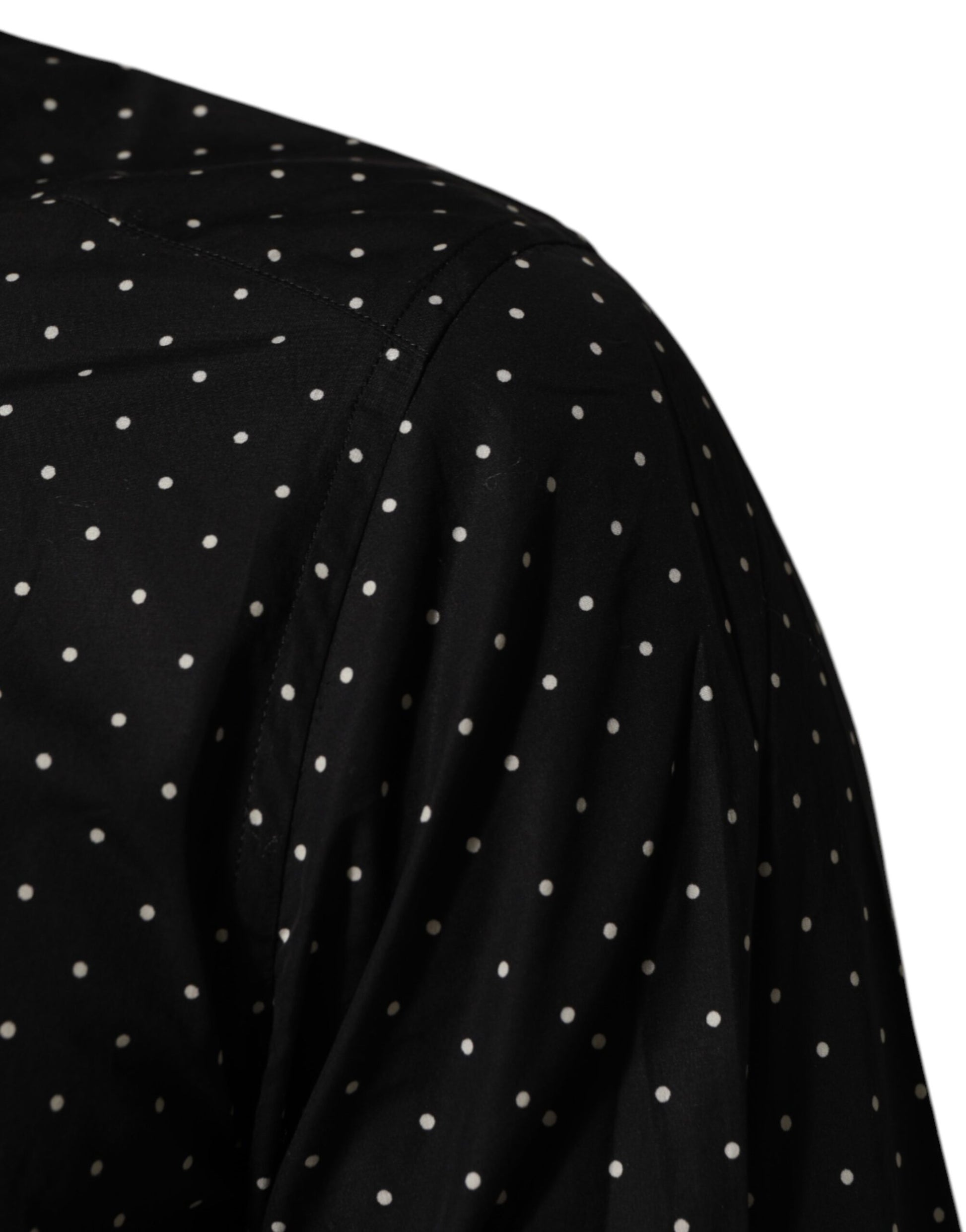 A black polka dot dress shirt with a gold men's formal design