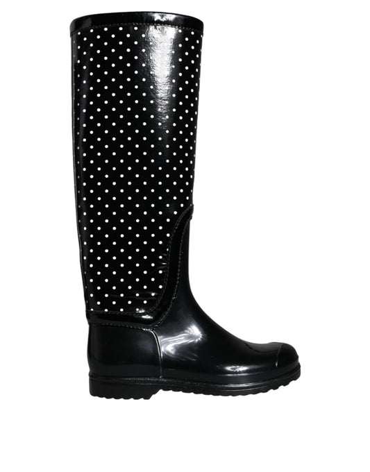Black rain boot with polka dots on side