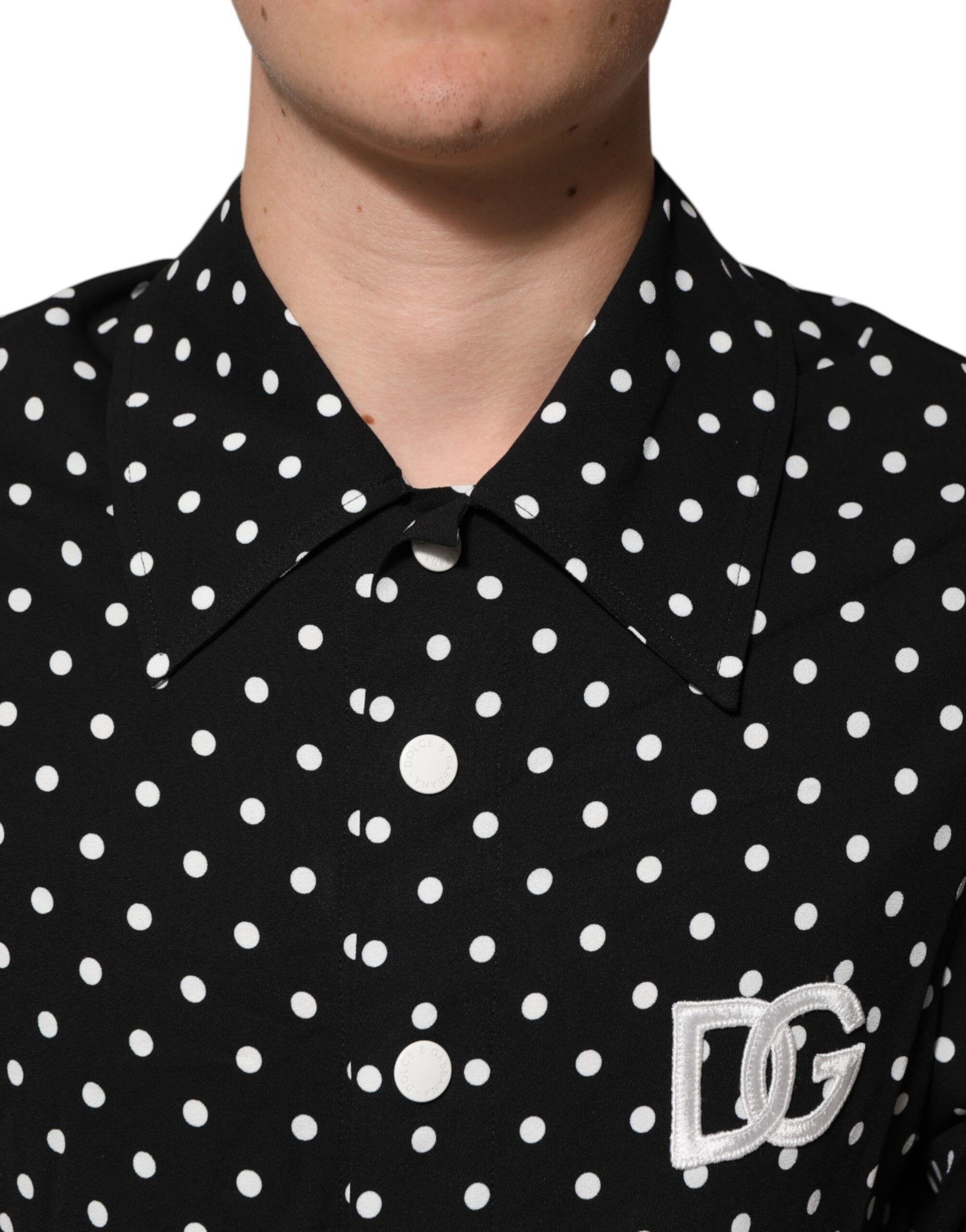 Black polka dot shirt with DC logo on left chest