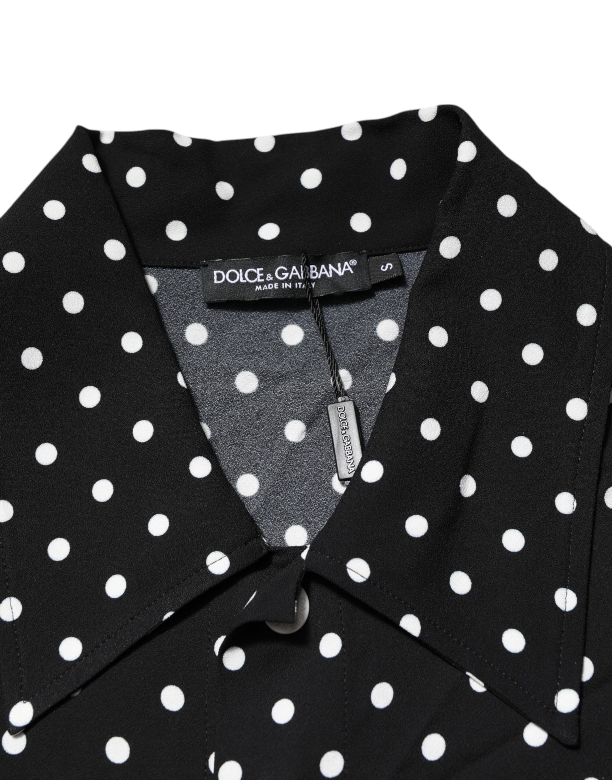 Black polka dot shirt with a V neckline