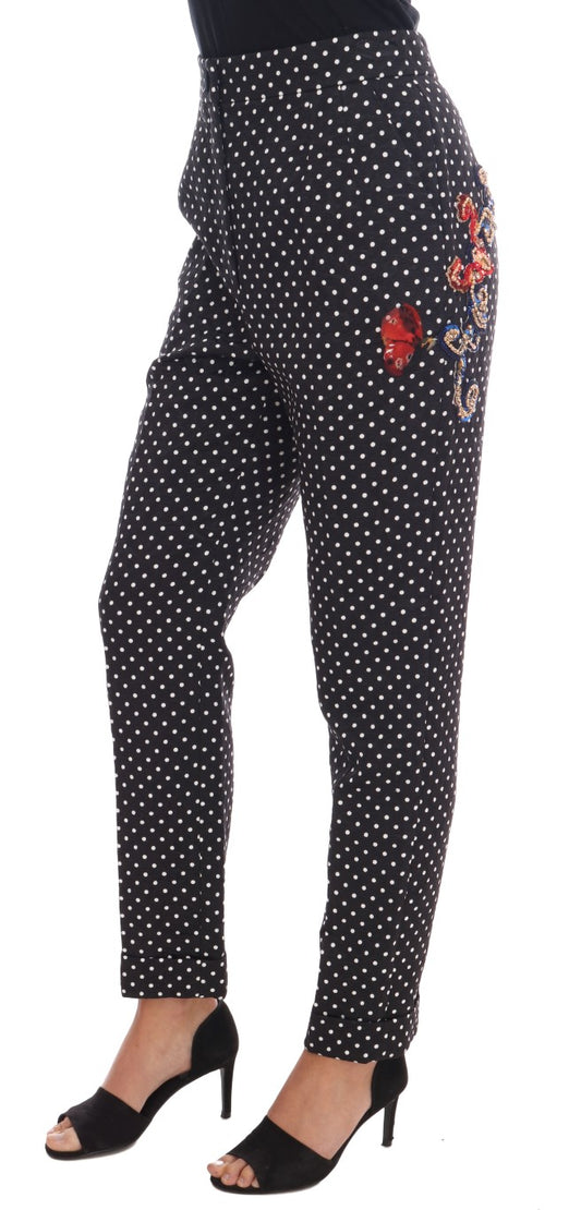 Pair of polka dot pants with floral embroidery on legs