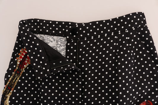Black shorts with white polka dots