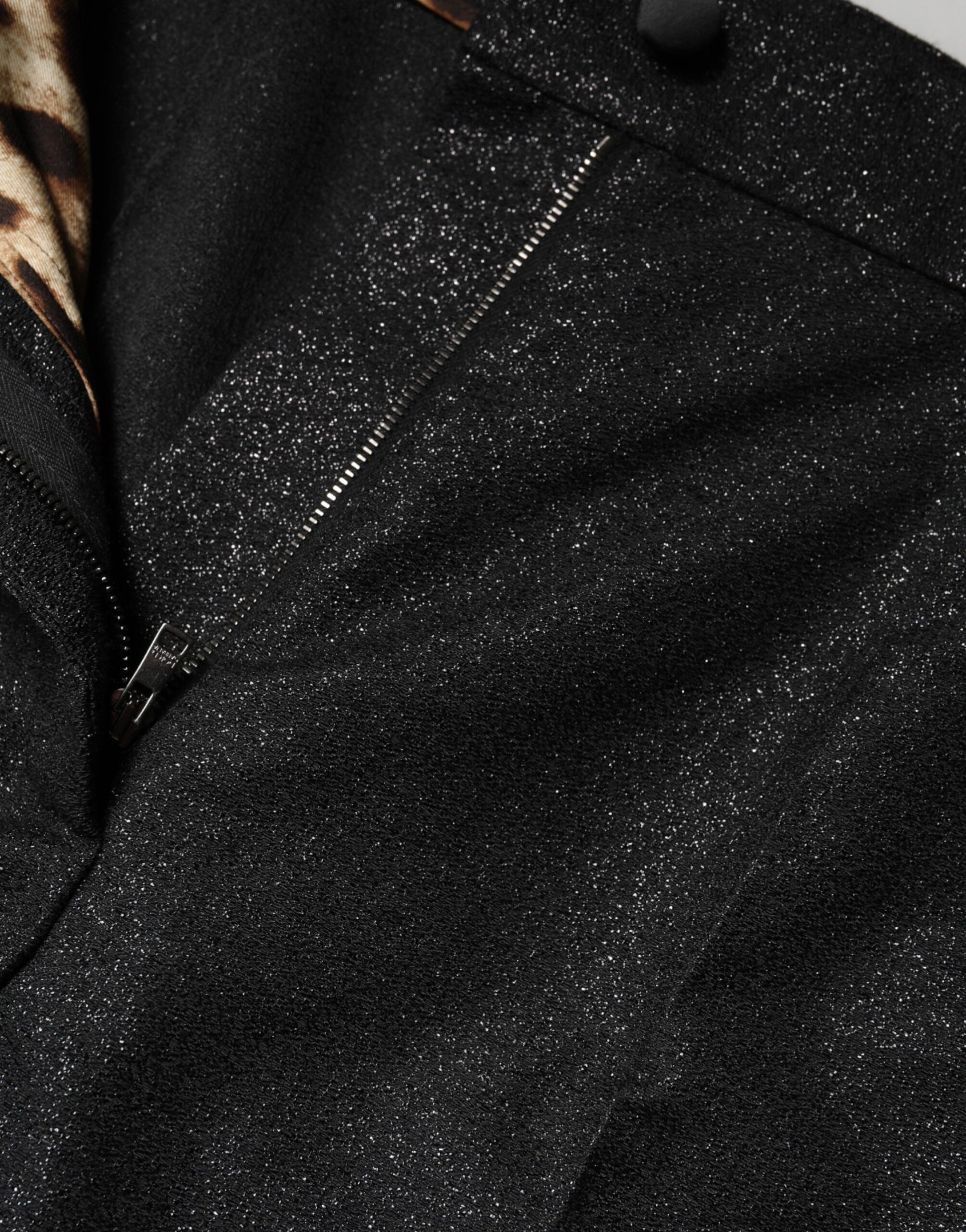 Black sequined pants with zipper detailing