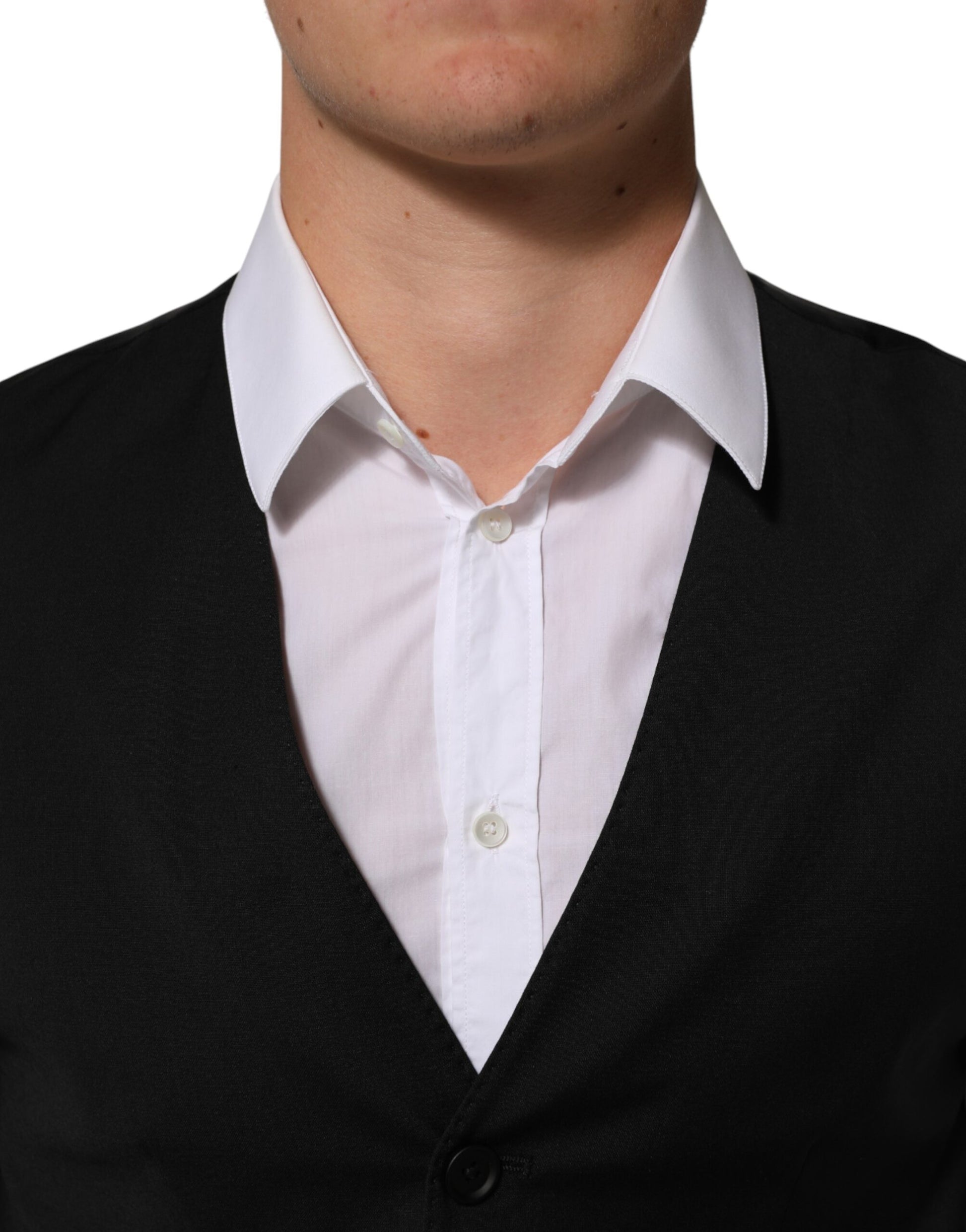 A black polyester vest from Dolce & Gabbana, part of a formal waistcoat