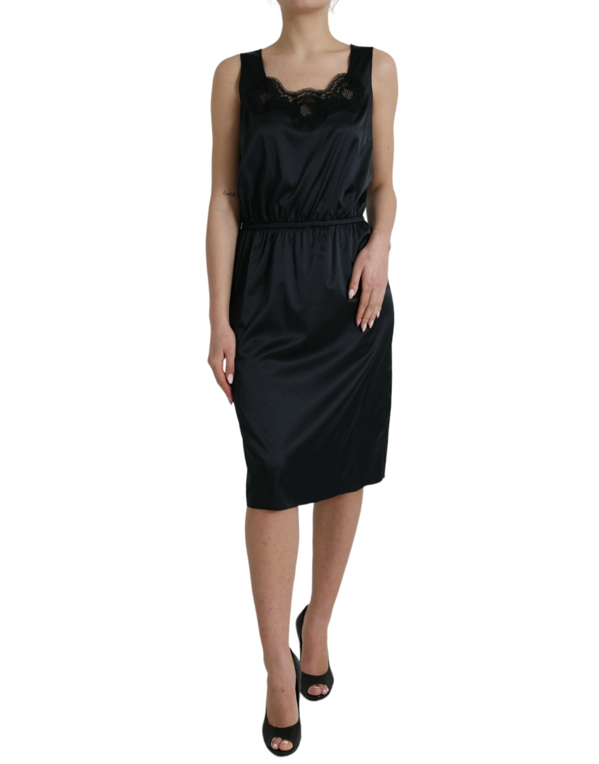 A black midi dress with lace trim from Dolce & Gabbana, made of polyester