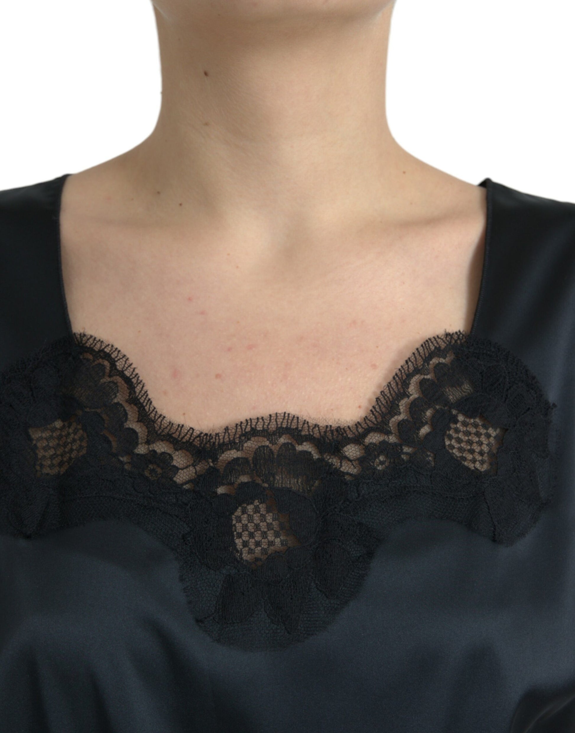 A black lace trim sheath midi dress with a high neckline and long sleeves
