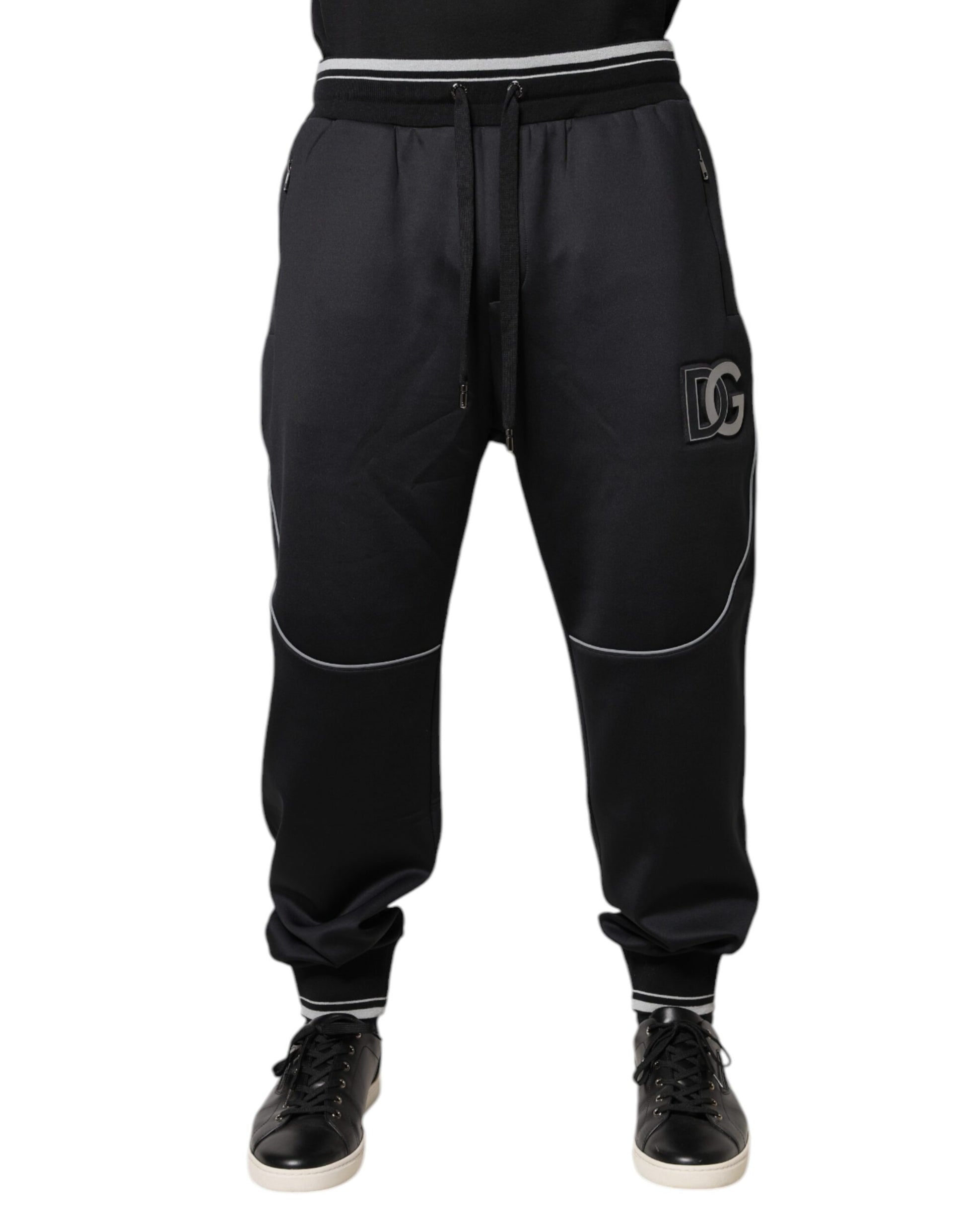 Black track pants with white stripe on side
