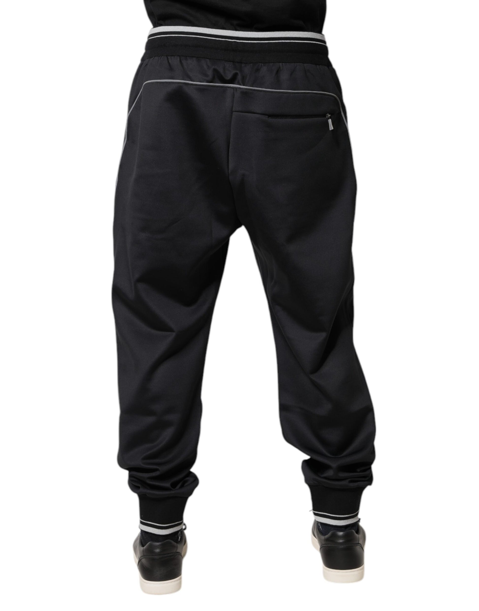Pair of black sweatpants with white stripe on side
