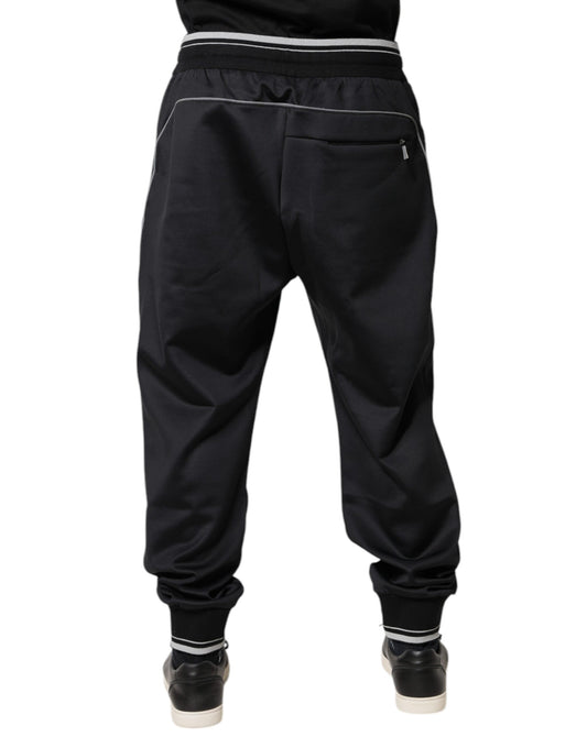 Pair of black sweatpants with white stripe on side