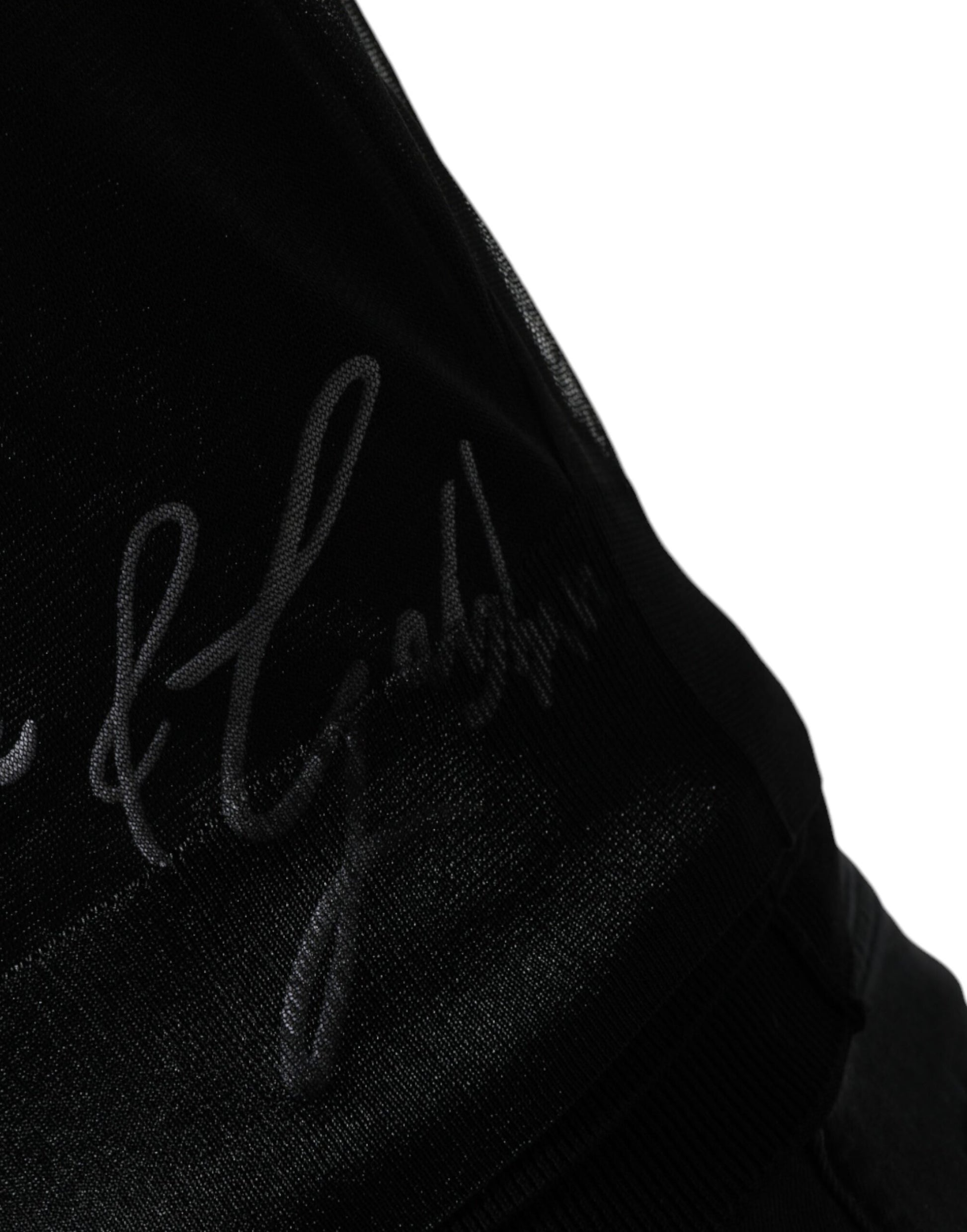 Black fabric with embroidered signature