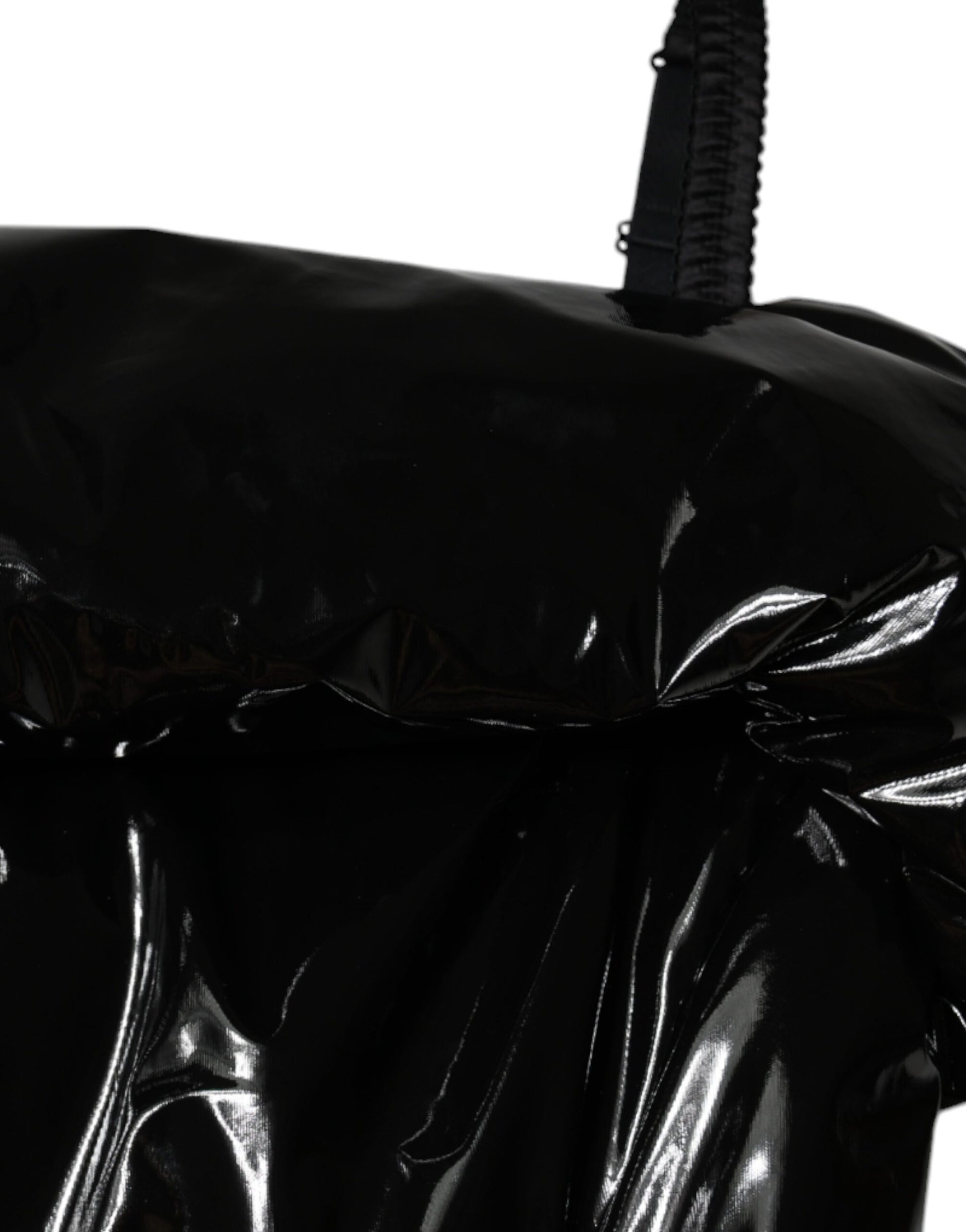 A black polyester ruched coated mini dress with a shiny texture