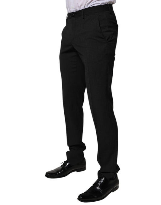 A pair of black polyester tapered formal men's dress pants from Dolce & Gabbana