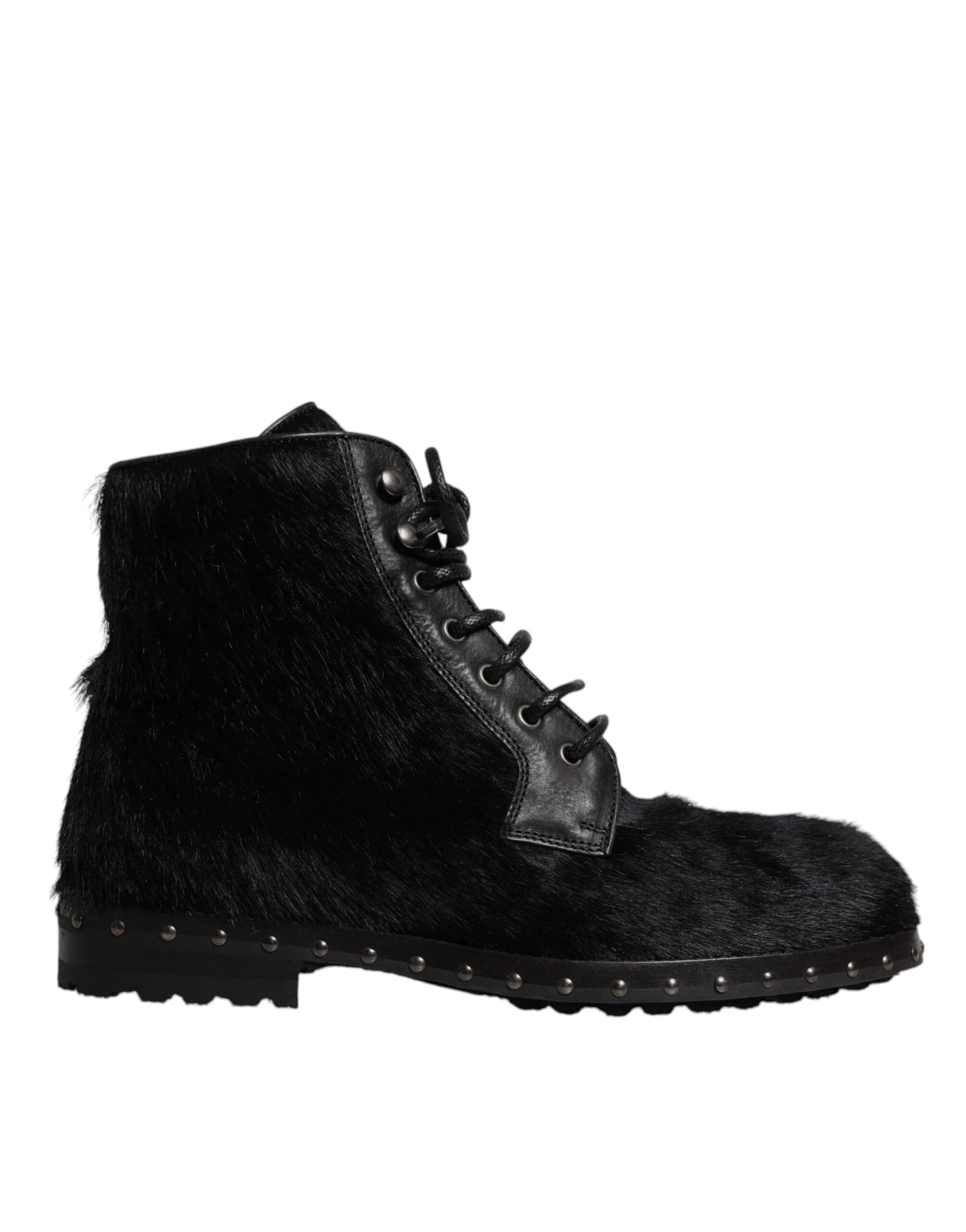 Fur lined boot with laces and studs on soles