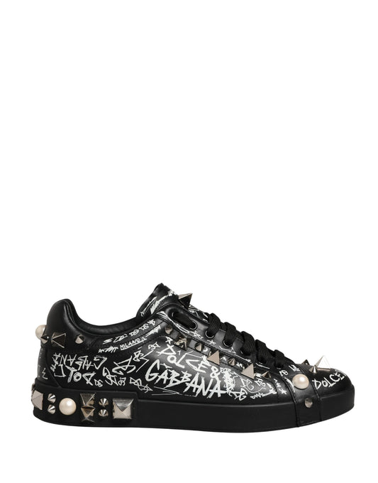 Black sneakers with graffiti text, studs and pearls on the side