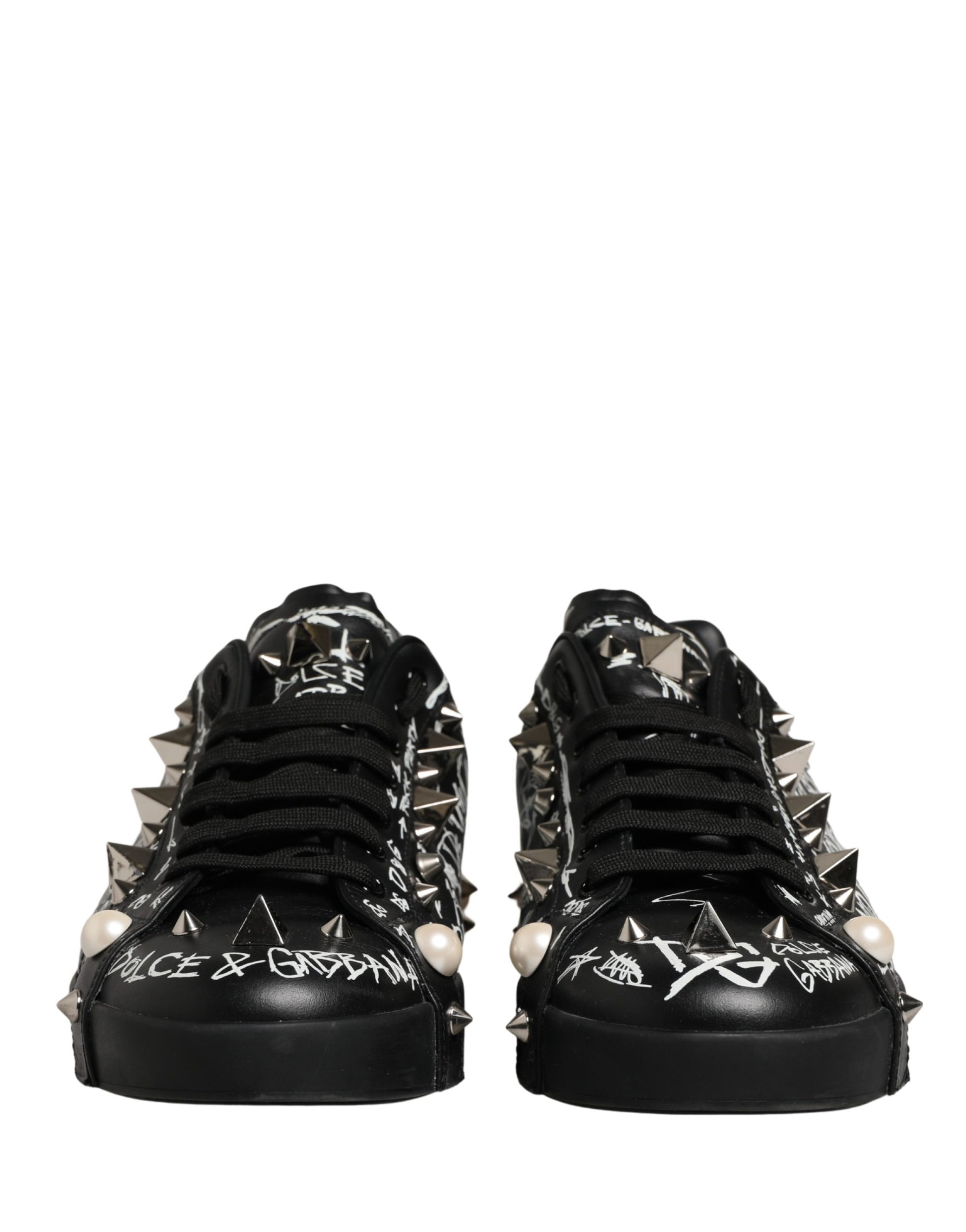 Pair of black D&G sneakers with graffiti design and studs