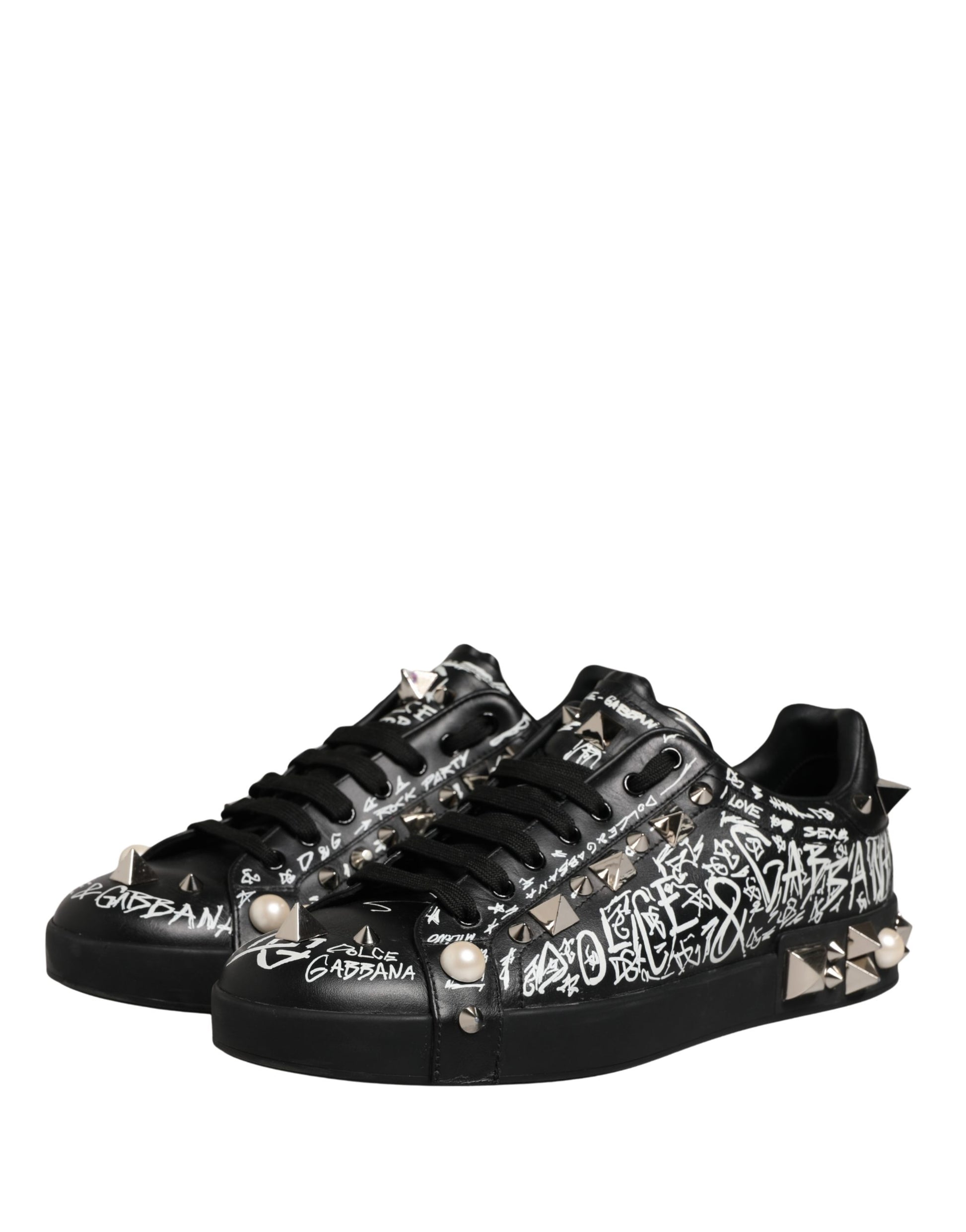 Black sneakers with graffiti design, studs and spikes on the side
