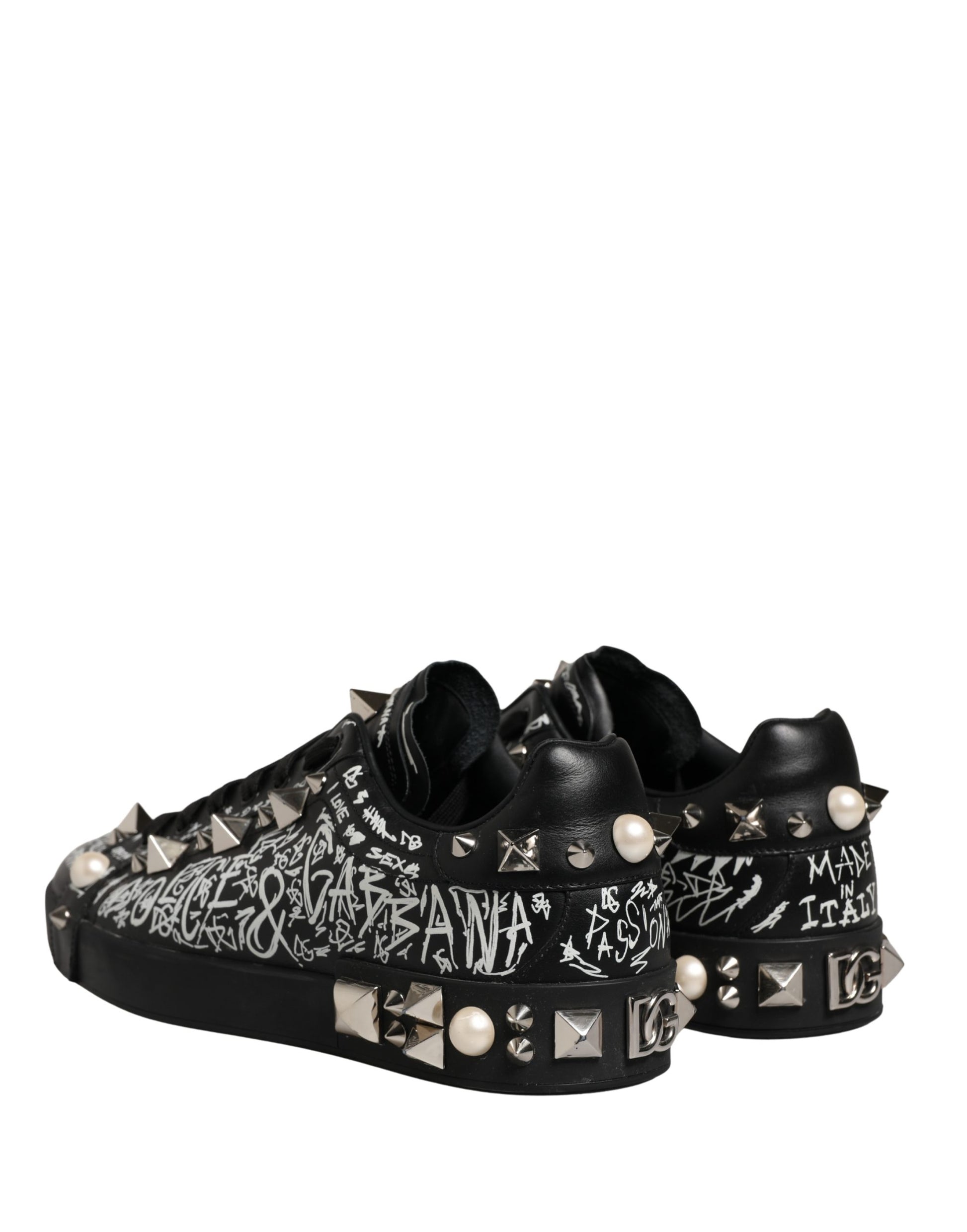 Black sneakers with graffiti design, studs and spikes on the side