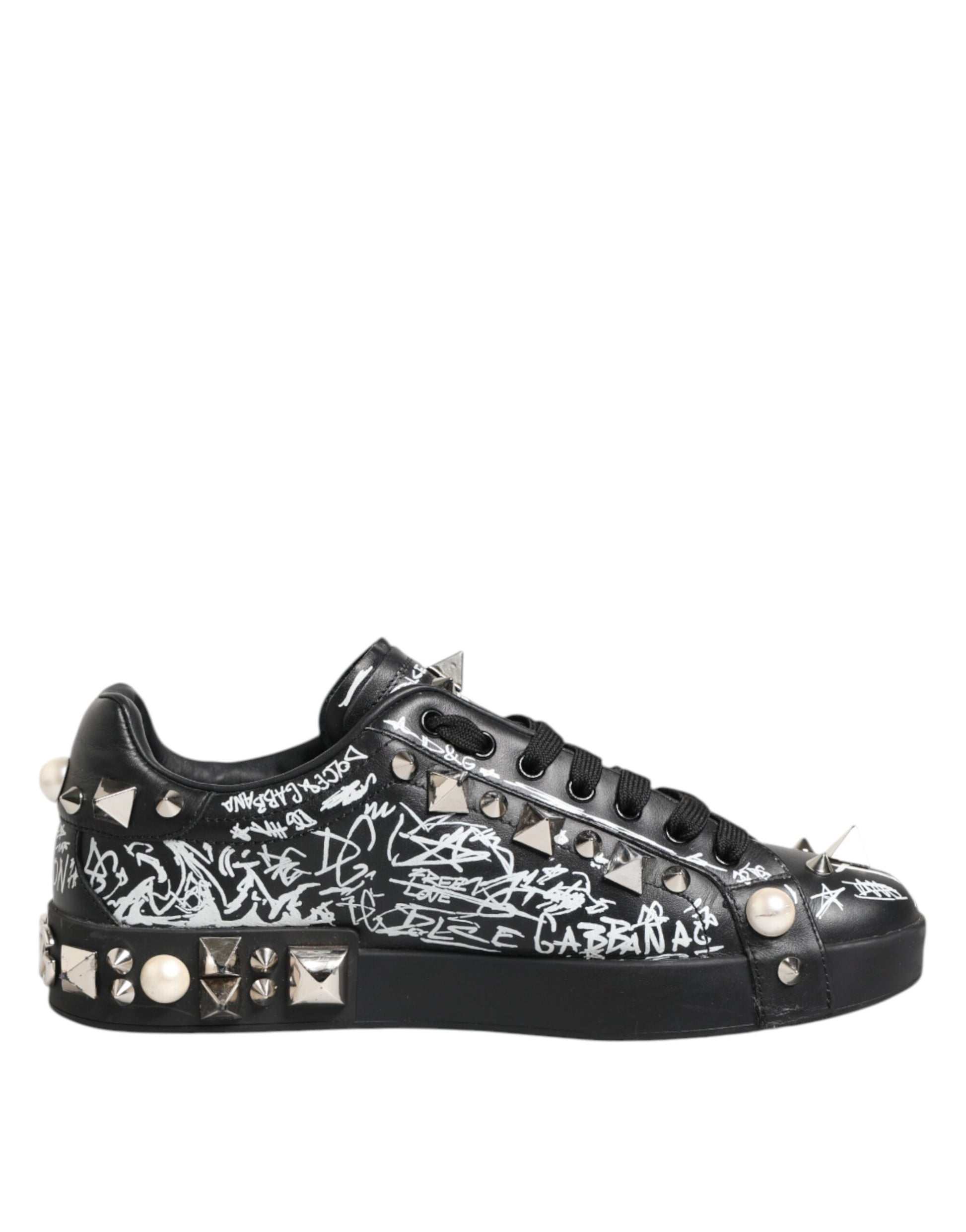 Black sneakers with studs, embellishments and a unique design on the side