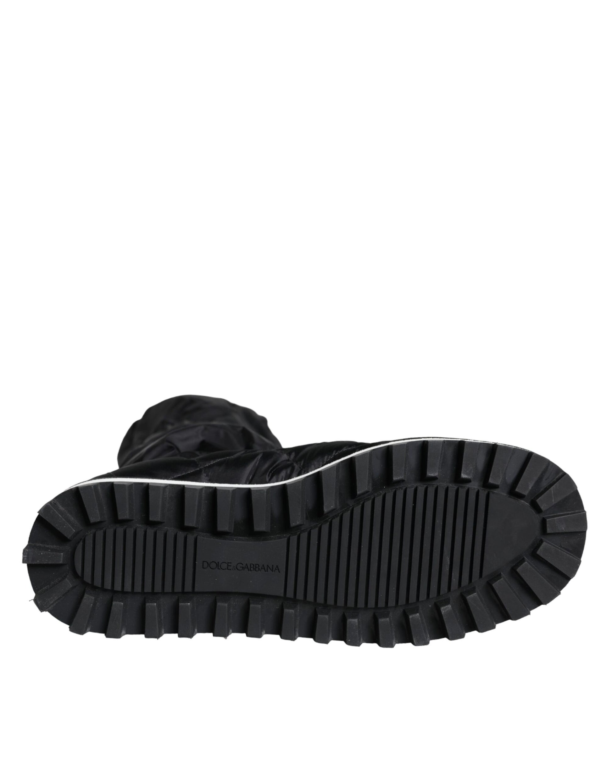 Black rubber boot with deep treads and a pull tab on the back