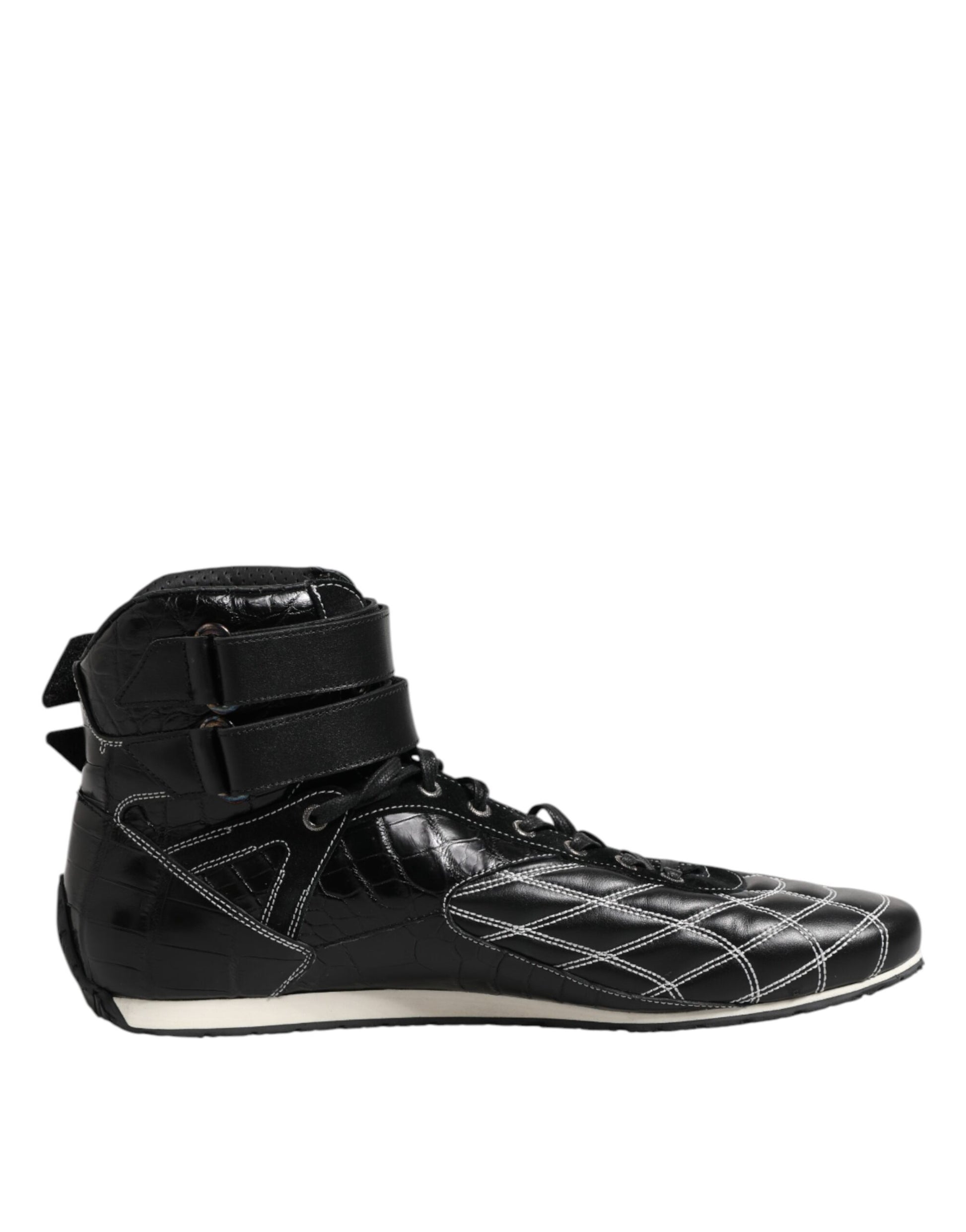 Black high top sneakers with white sole