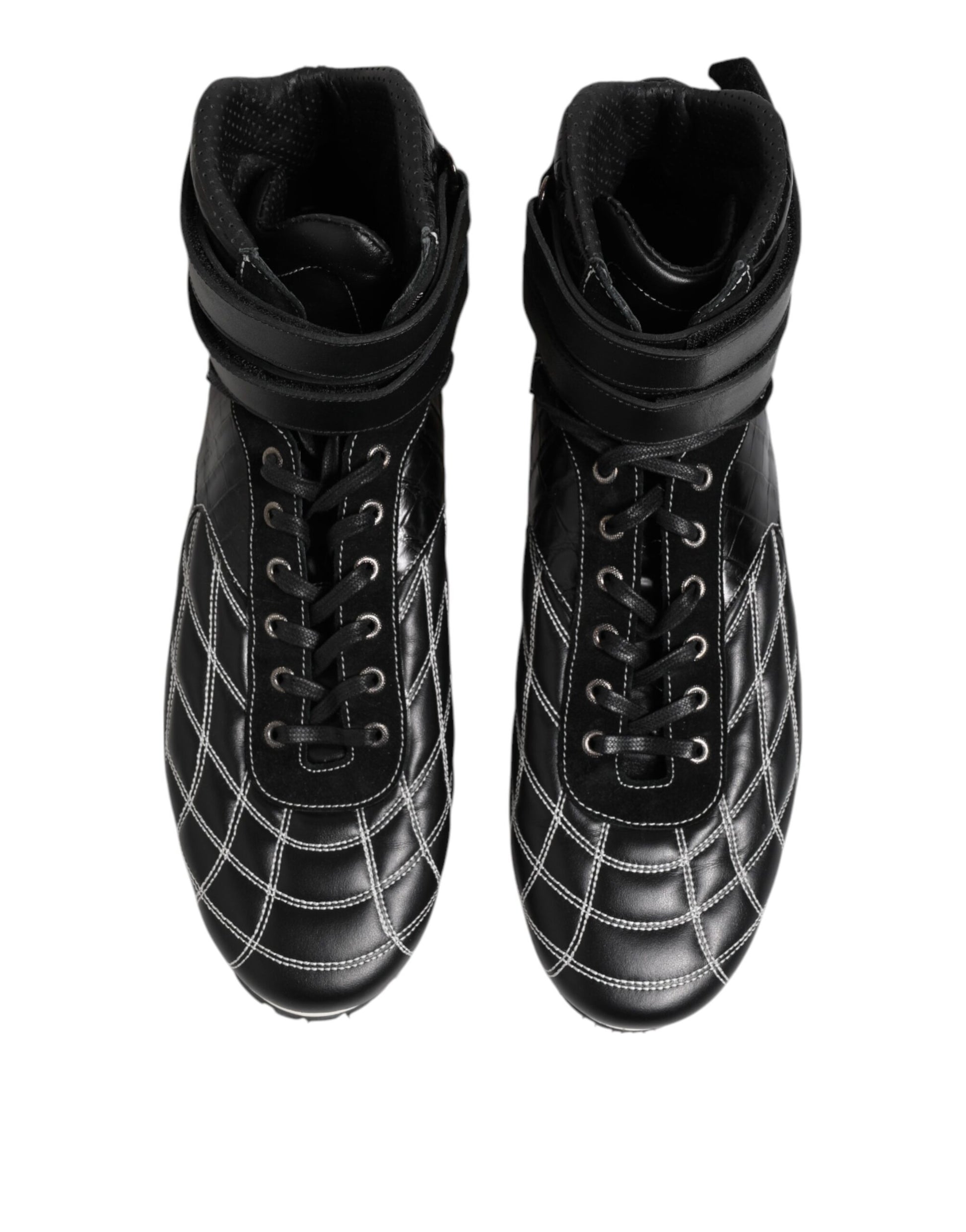 Pair of black boots with laces and buckles