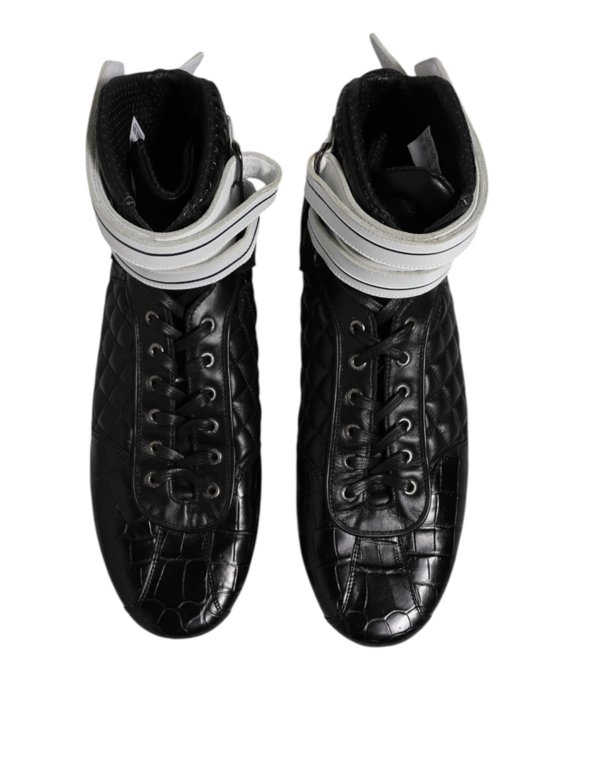 Pair of black leather boots with silver buckles