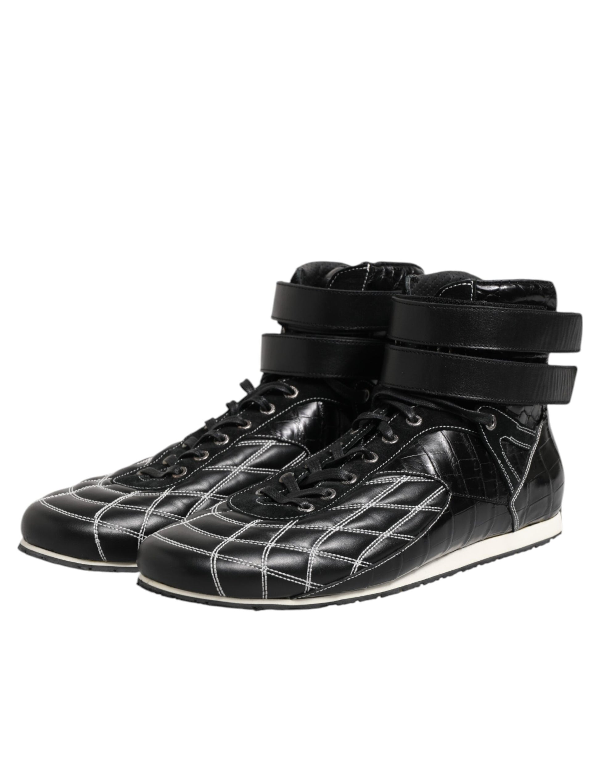 Pair of black and white sneakers with laces