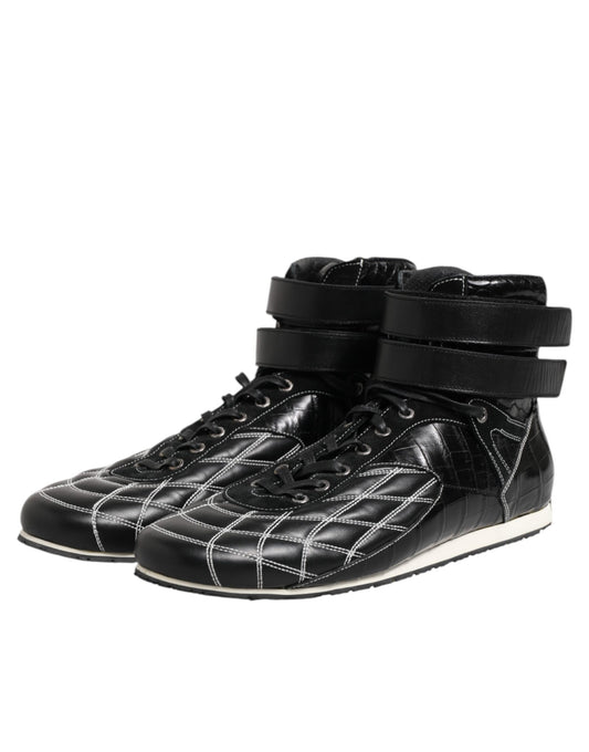 Pair of black and white sneakers with laces