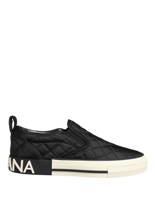Black quilted slip-on shoes with white sole and logo