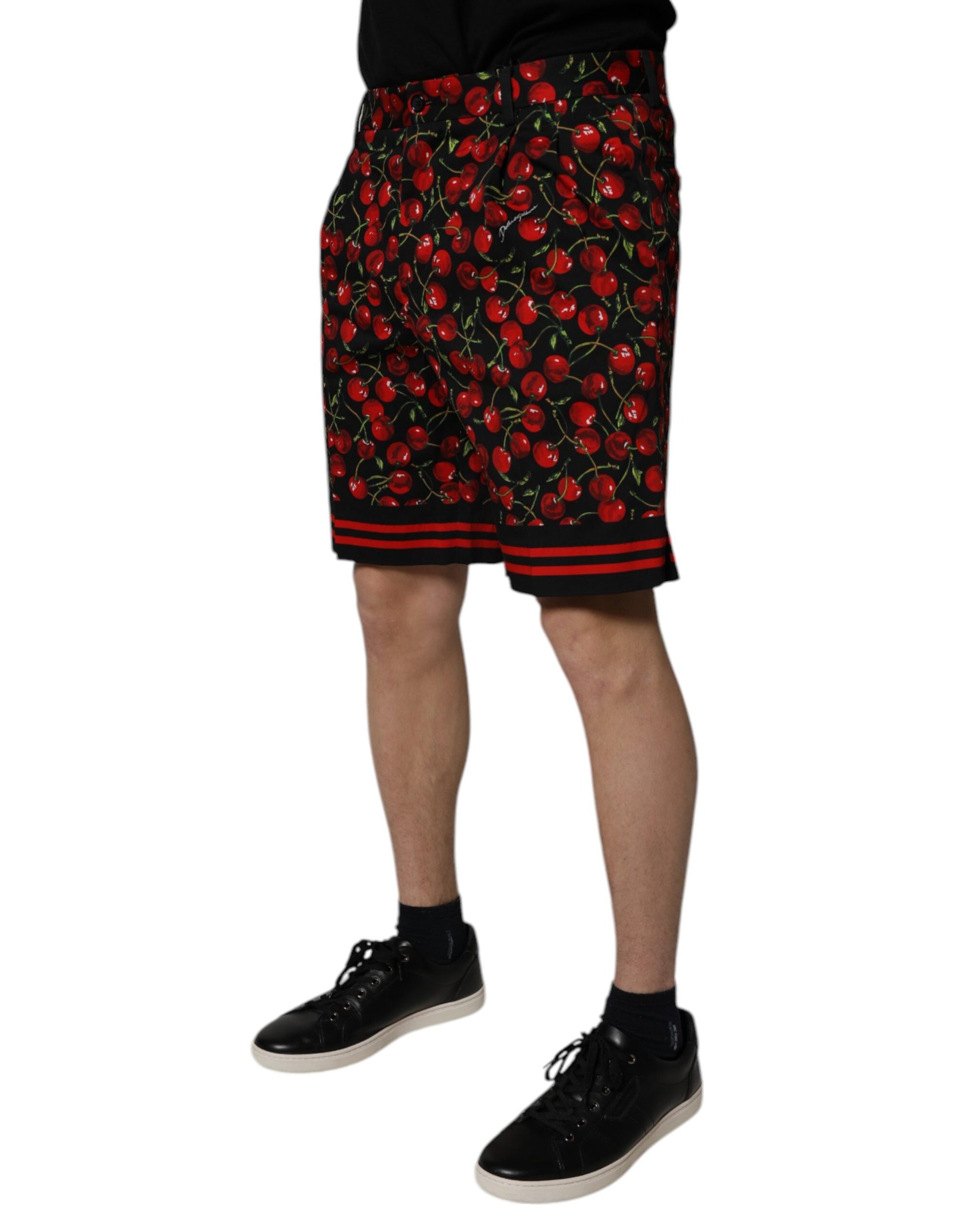 Shorts with red fruit pattern on white background