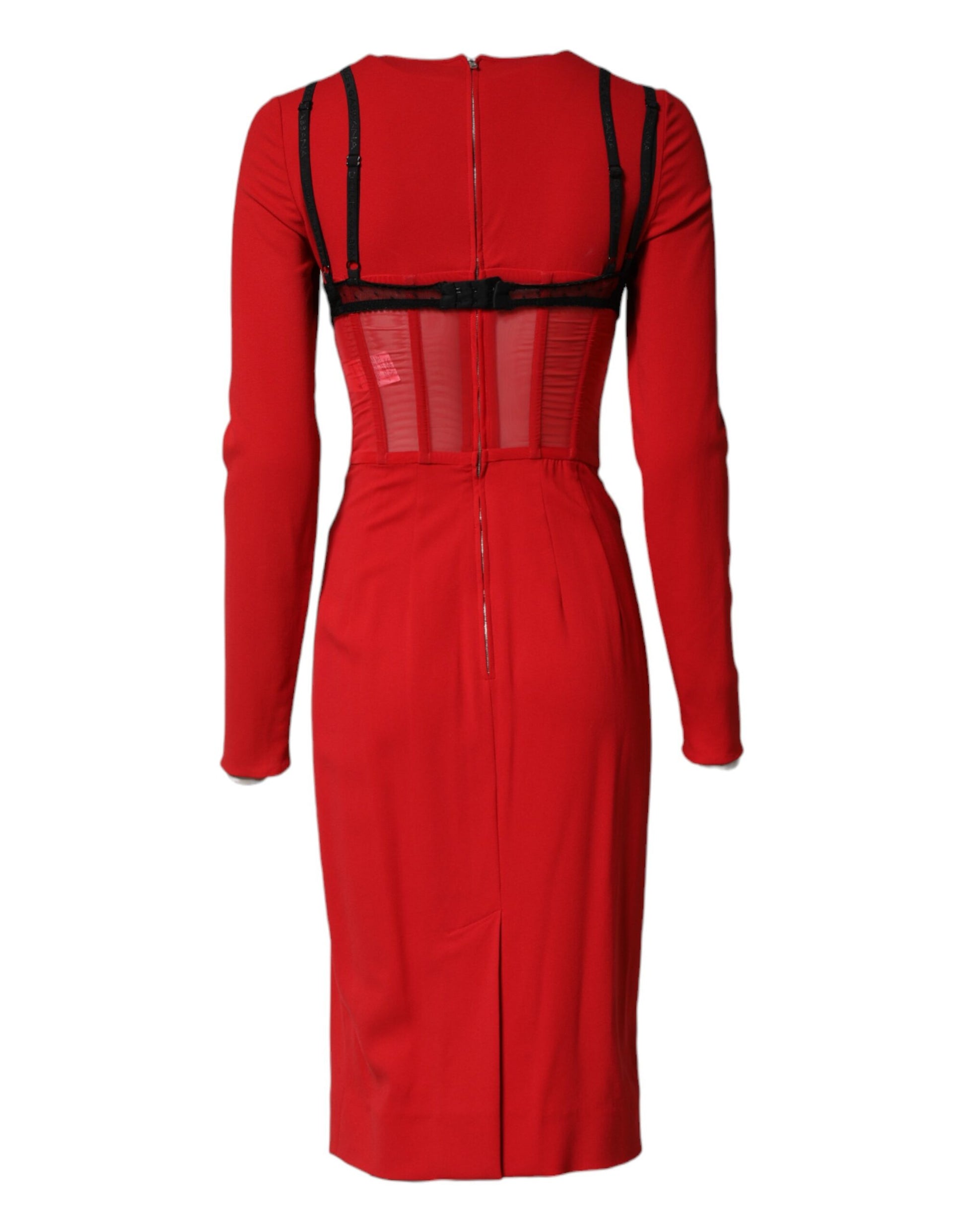 A red midi dress with black contrasting bra straps and a zipper in the front