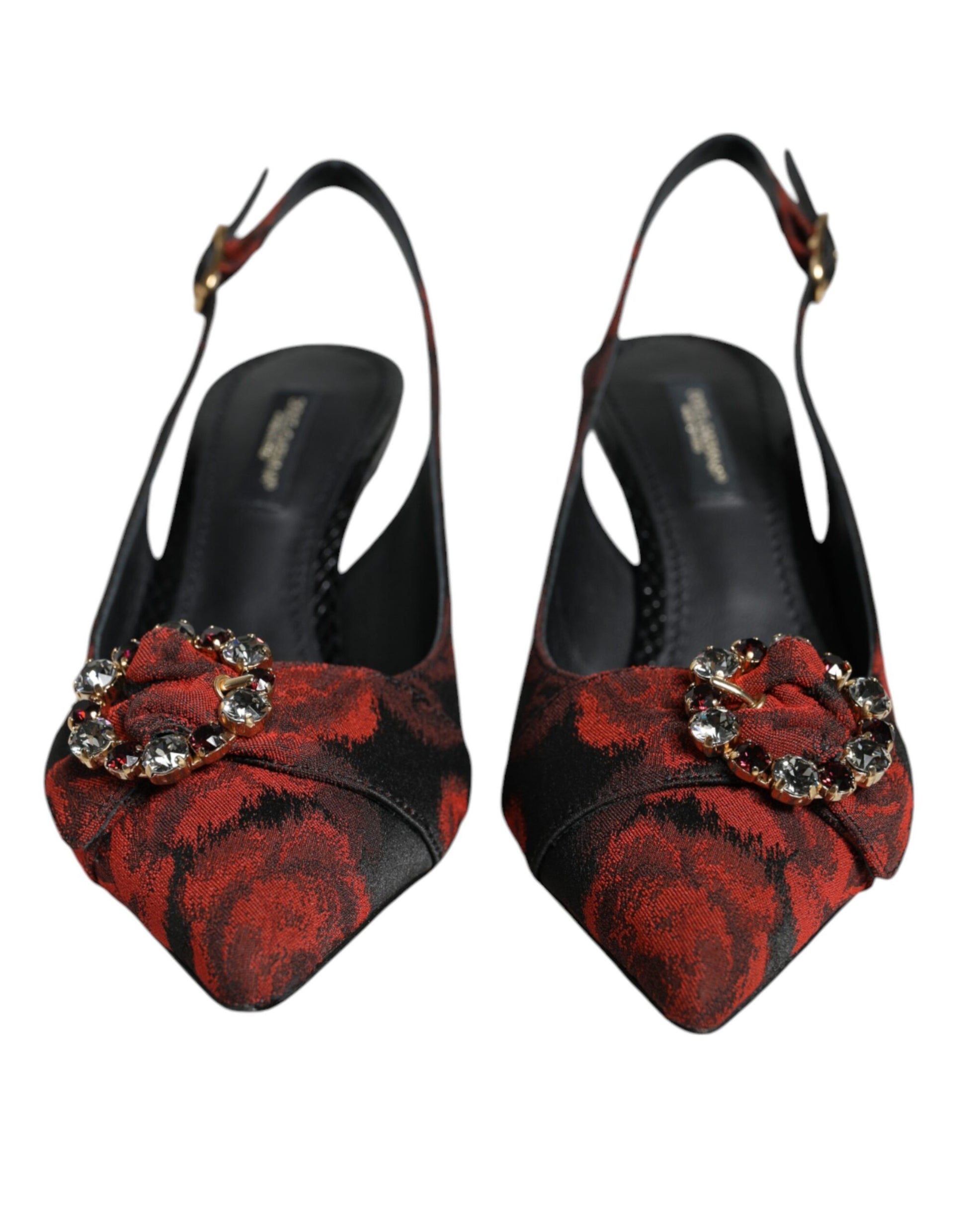 Pair of high heel shoes with red and black design